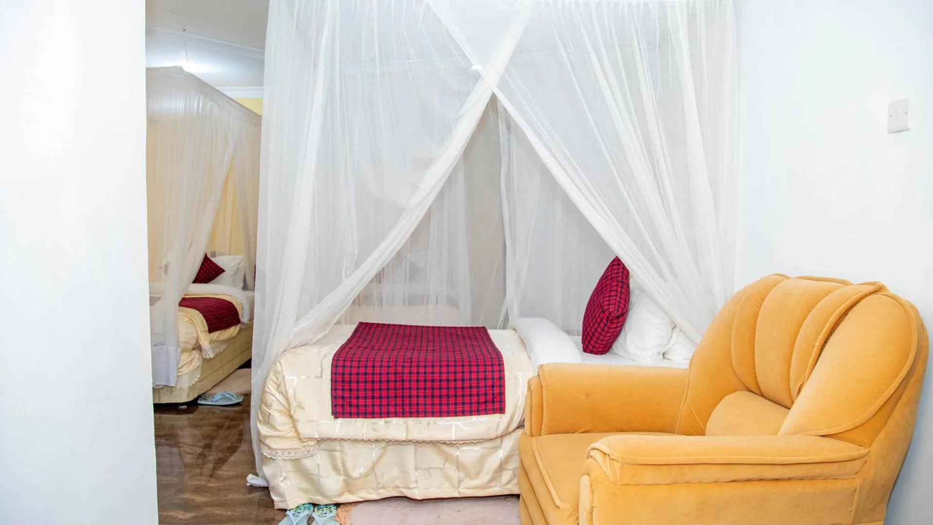 Bed in Karibu Heritage House