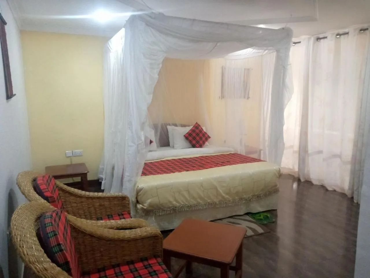 Bed in Karibu Heritage House