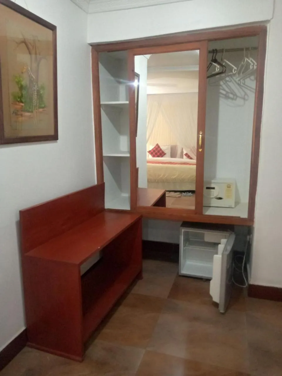 Bed in Karibu Heritage House