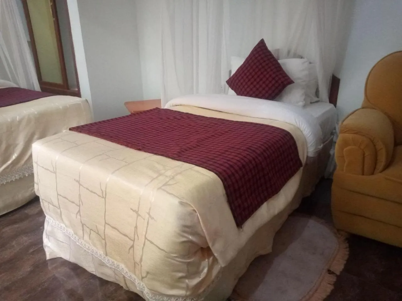 Bed in Karibu Heritage House