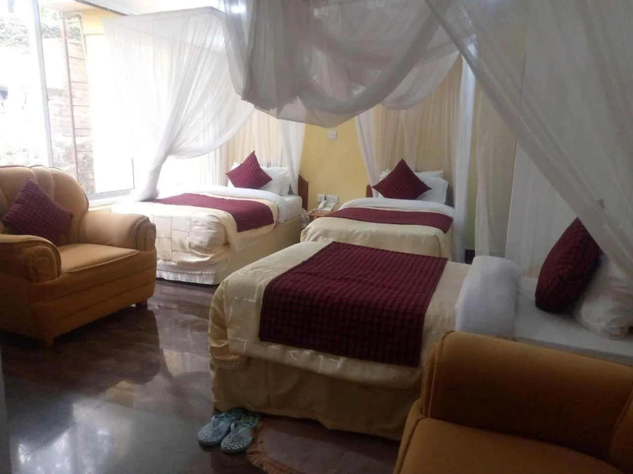 Bed in Karibu Heritage House