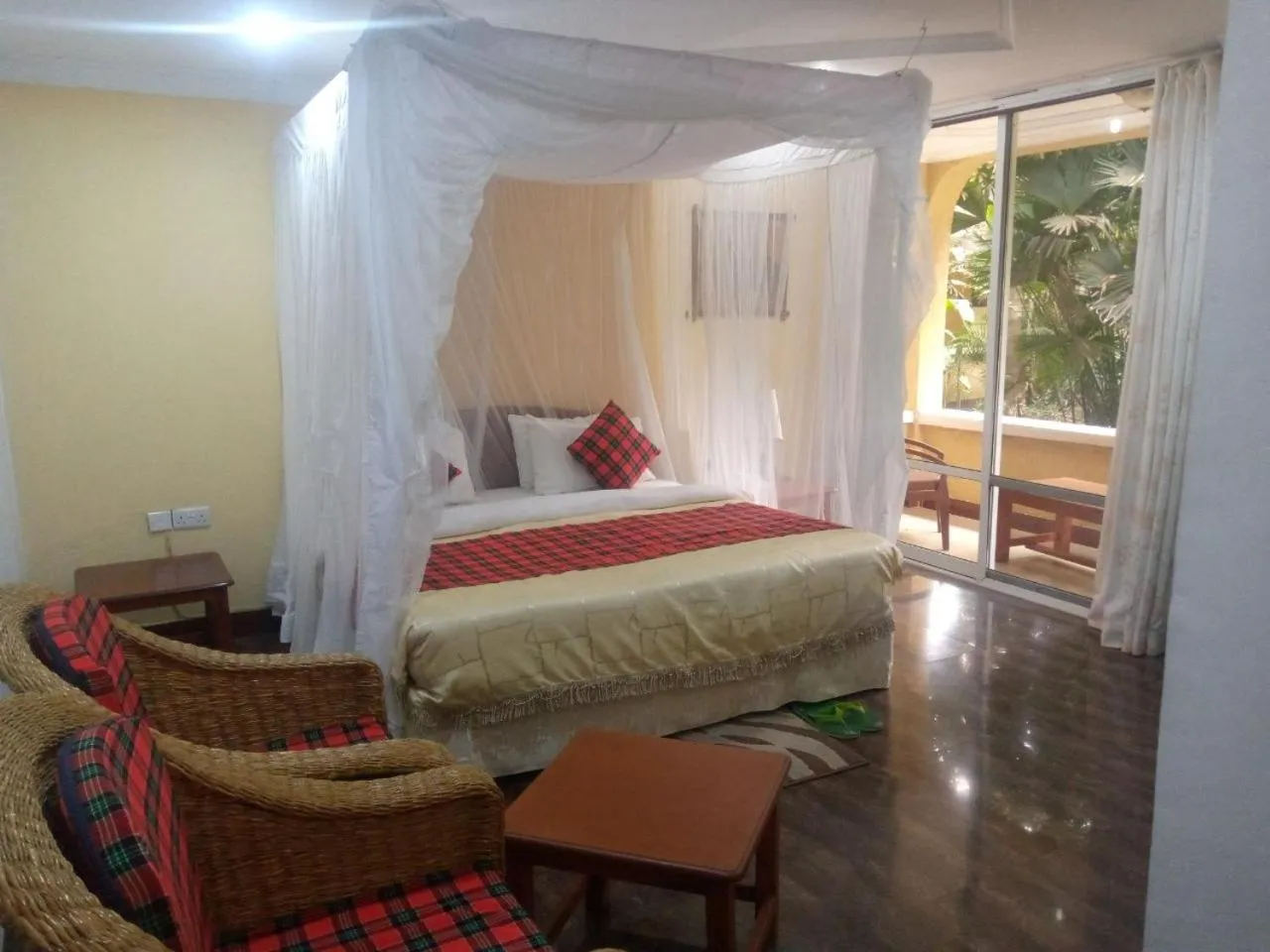 Bed in Karibu Heritage House