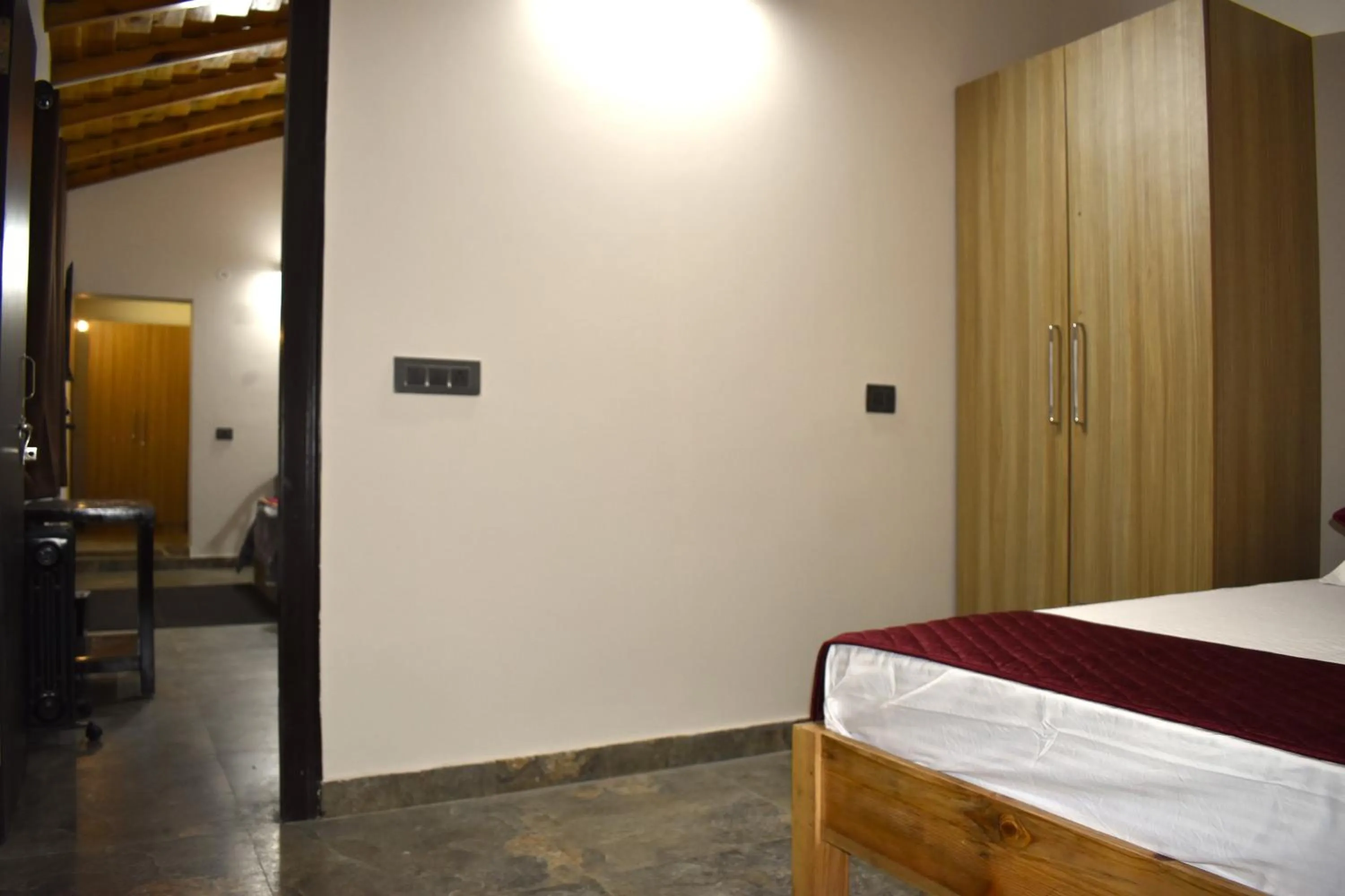 Bed in Captains Paradise Luxury Resort at Mukteshwar Hill Station