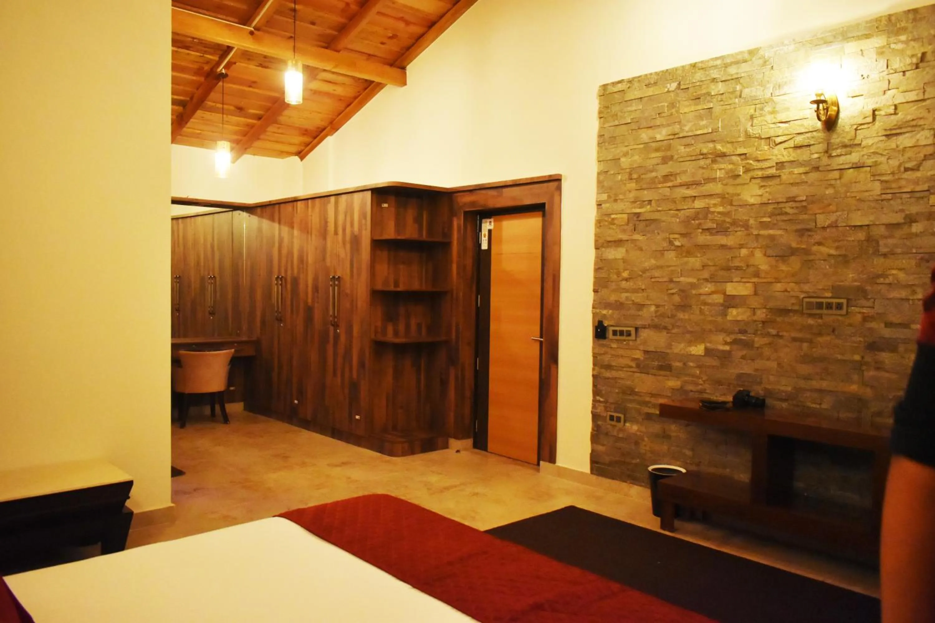 Bed in Captains Paradise Luxury Resort at Mukteshwar Hill Station