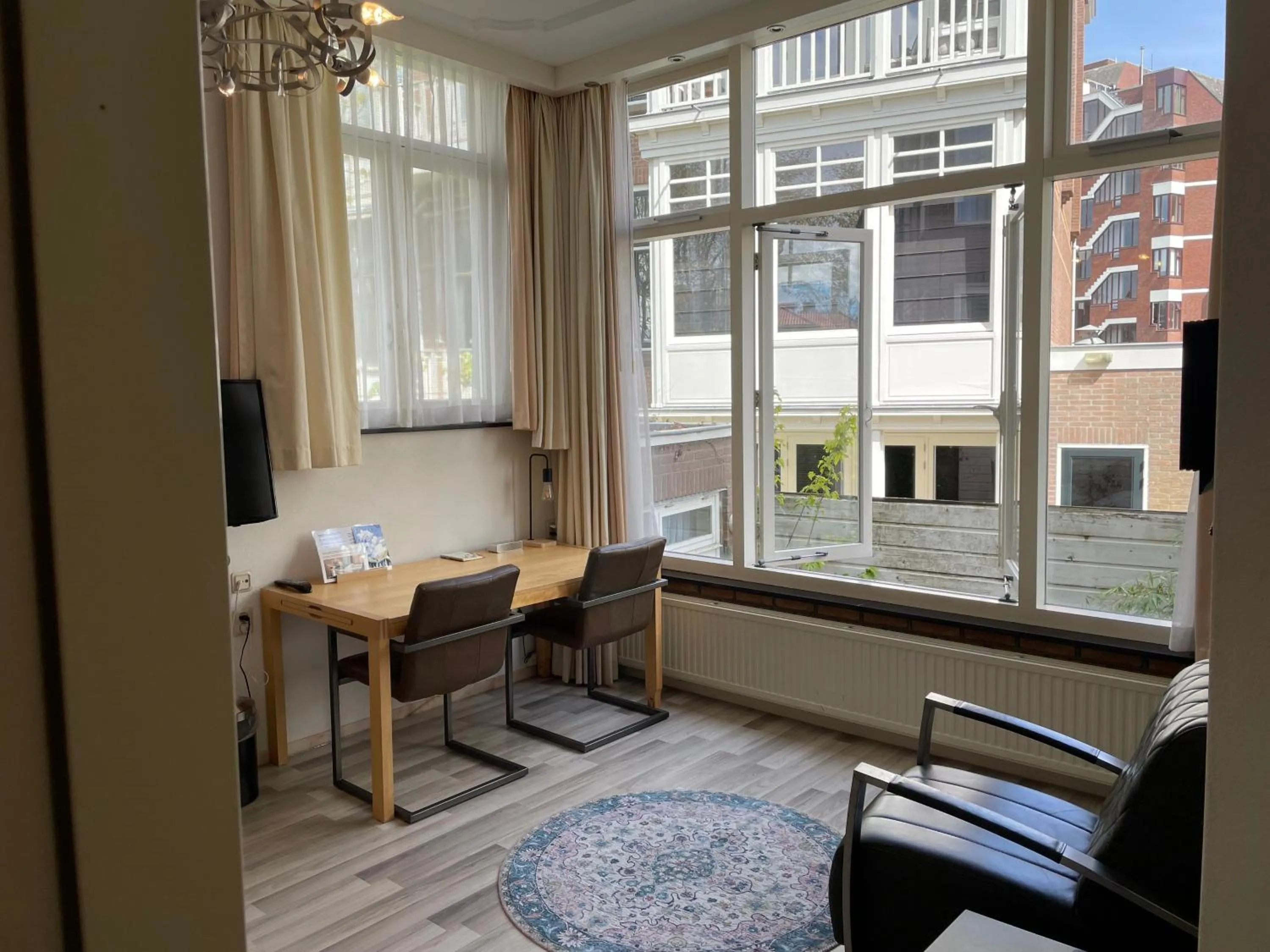 Seating area in Plato by Hofstad Studio’s