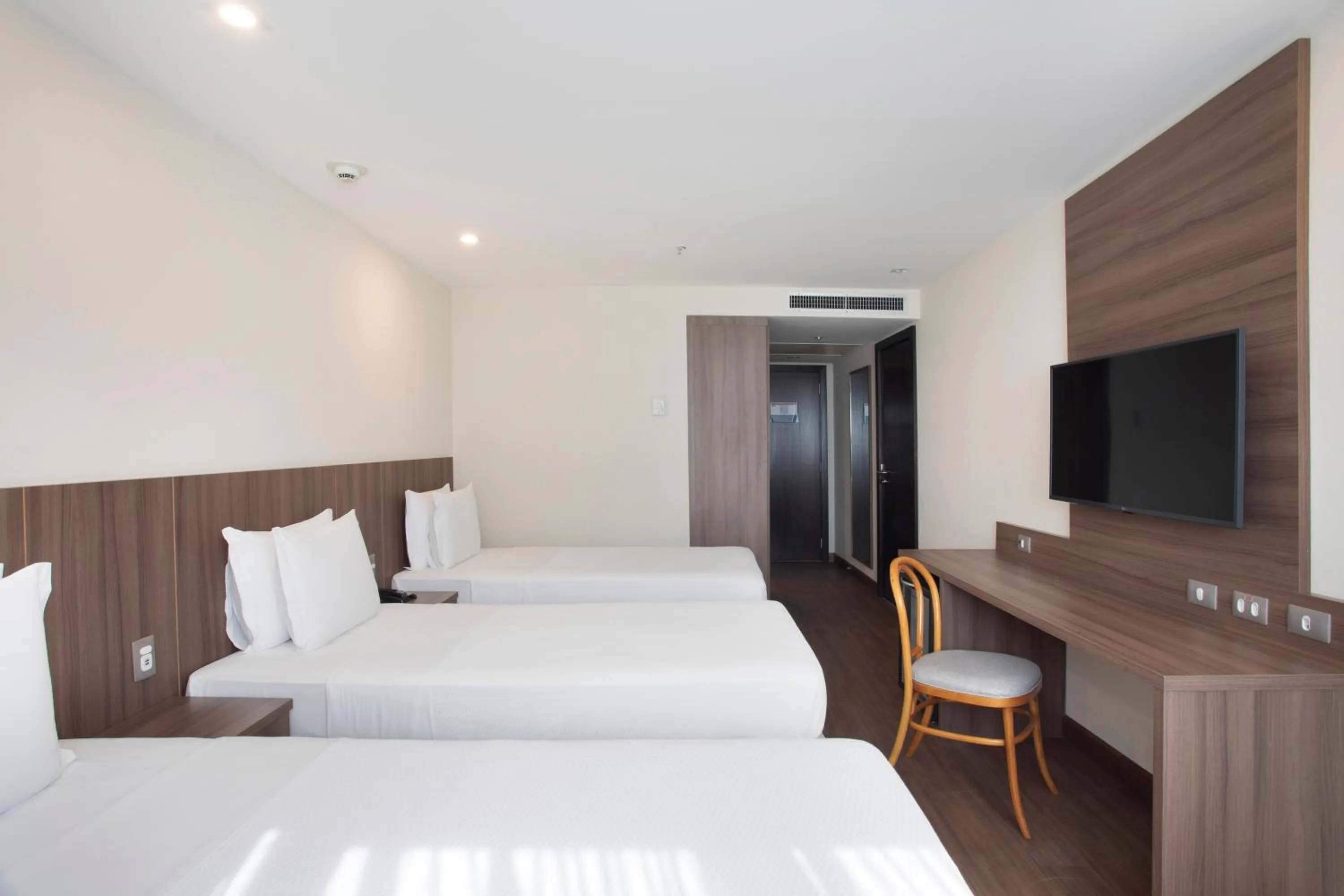 Bed in Windsor Tower Hotel