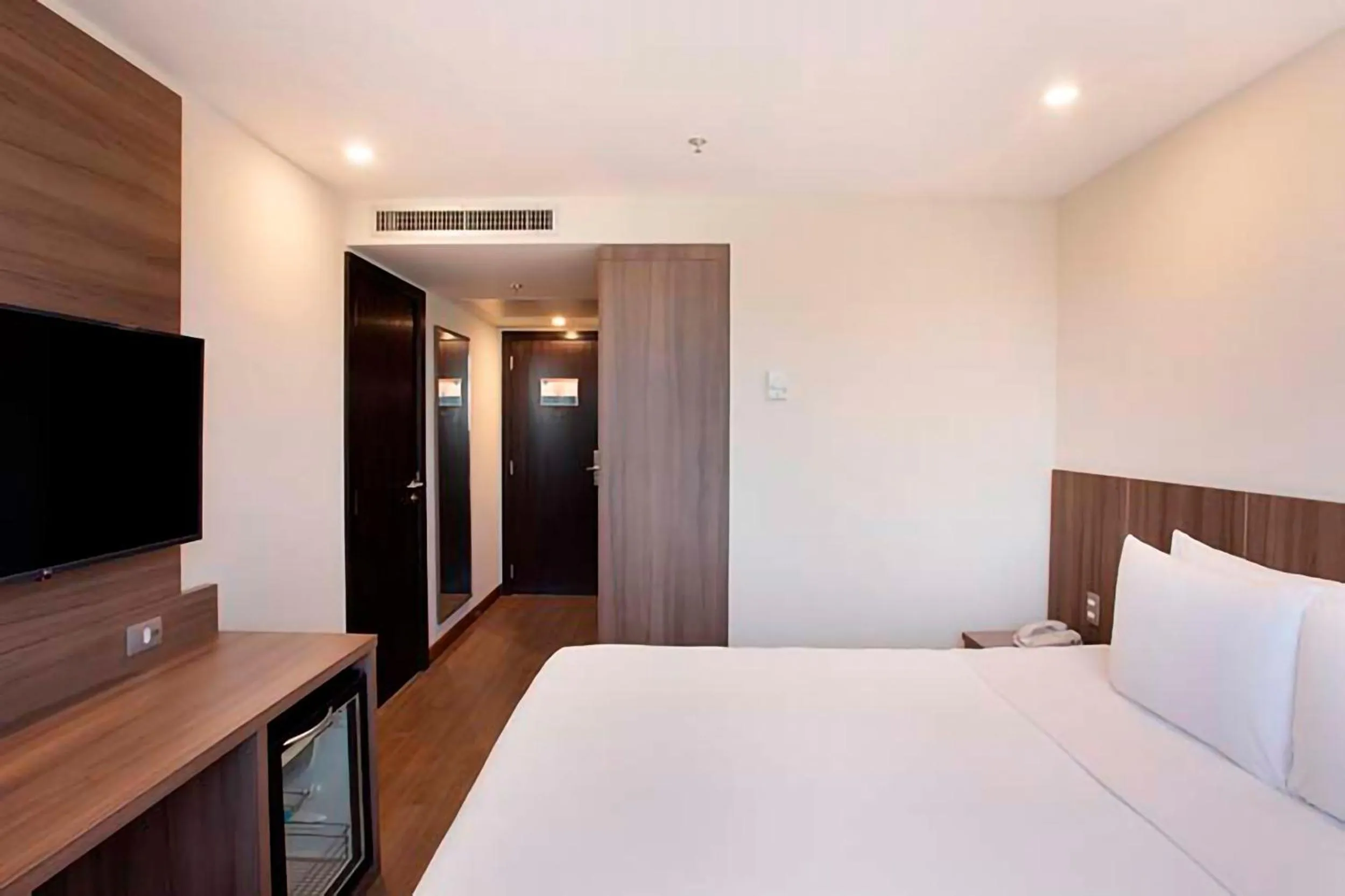 Bed in Windsor Tower Hotel