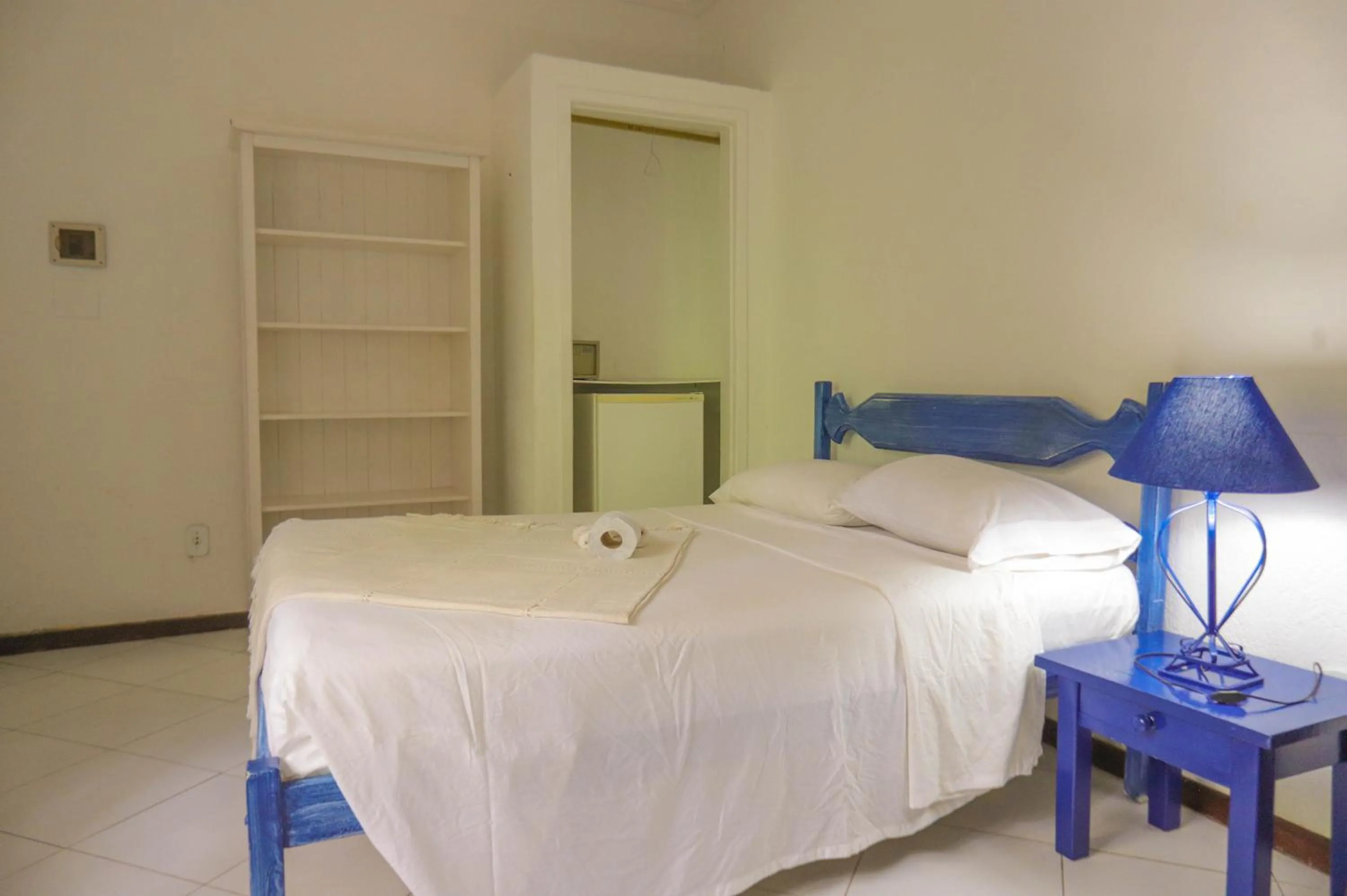 Bed in POUSADA AMENDOEIRA