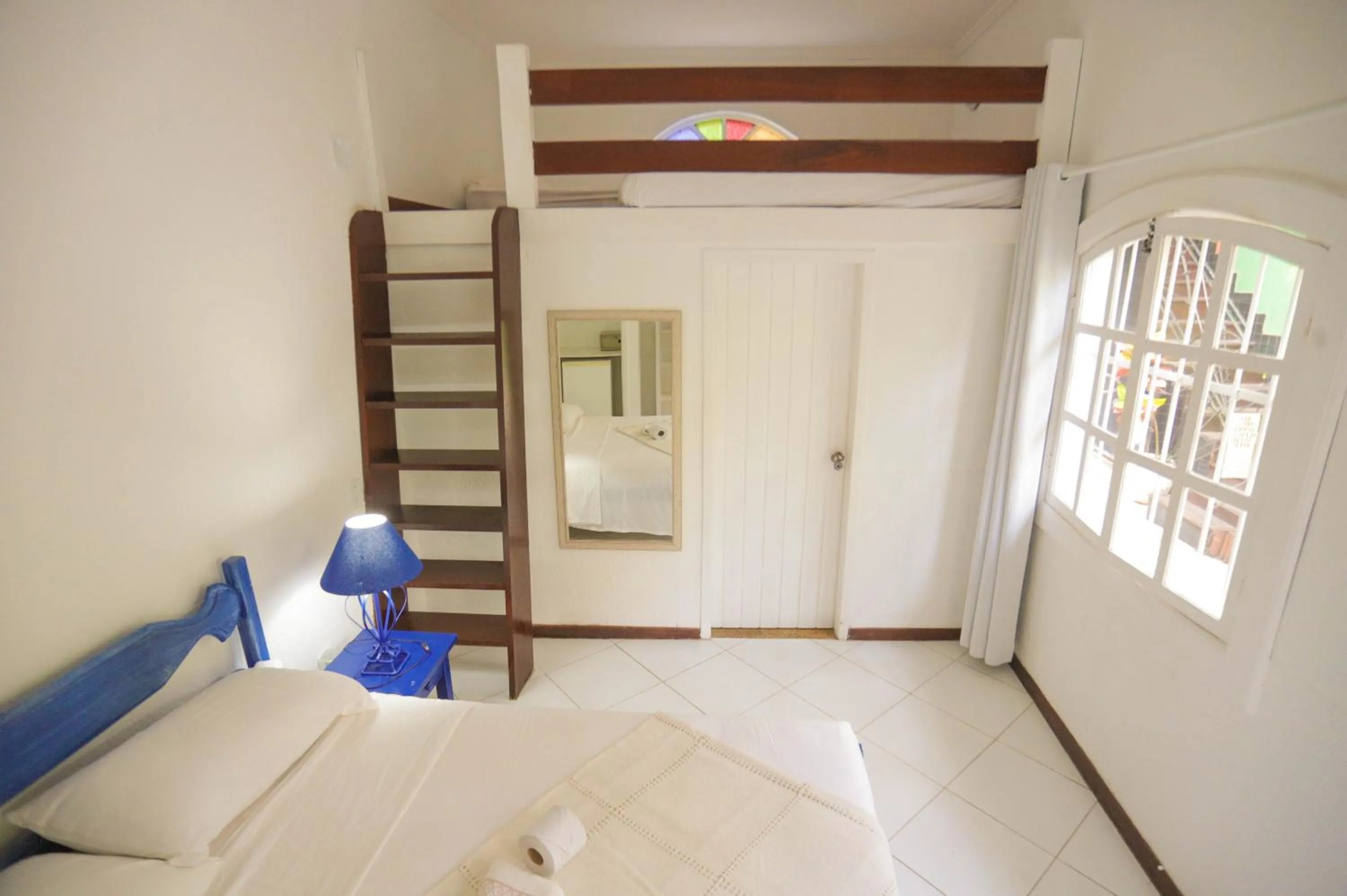 Bed in POUSADA AMENDOEIRA