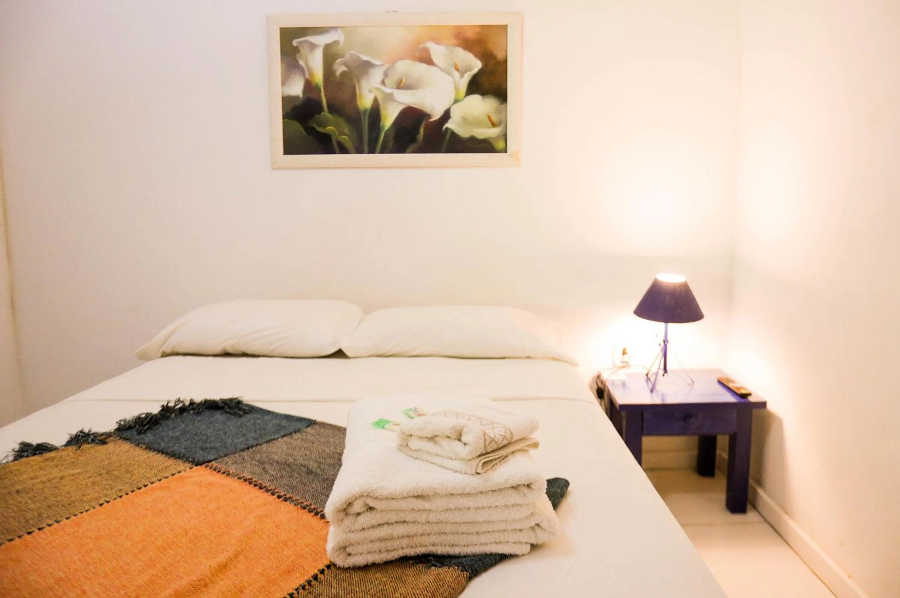 Bed in POUSADA AMENDOEIRA