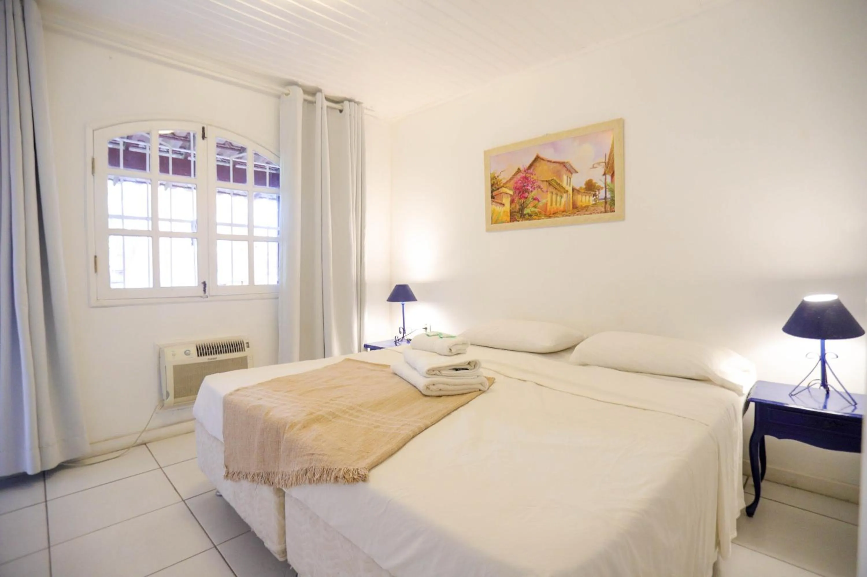 Bed in POUSADA AMENDOEIRA