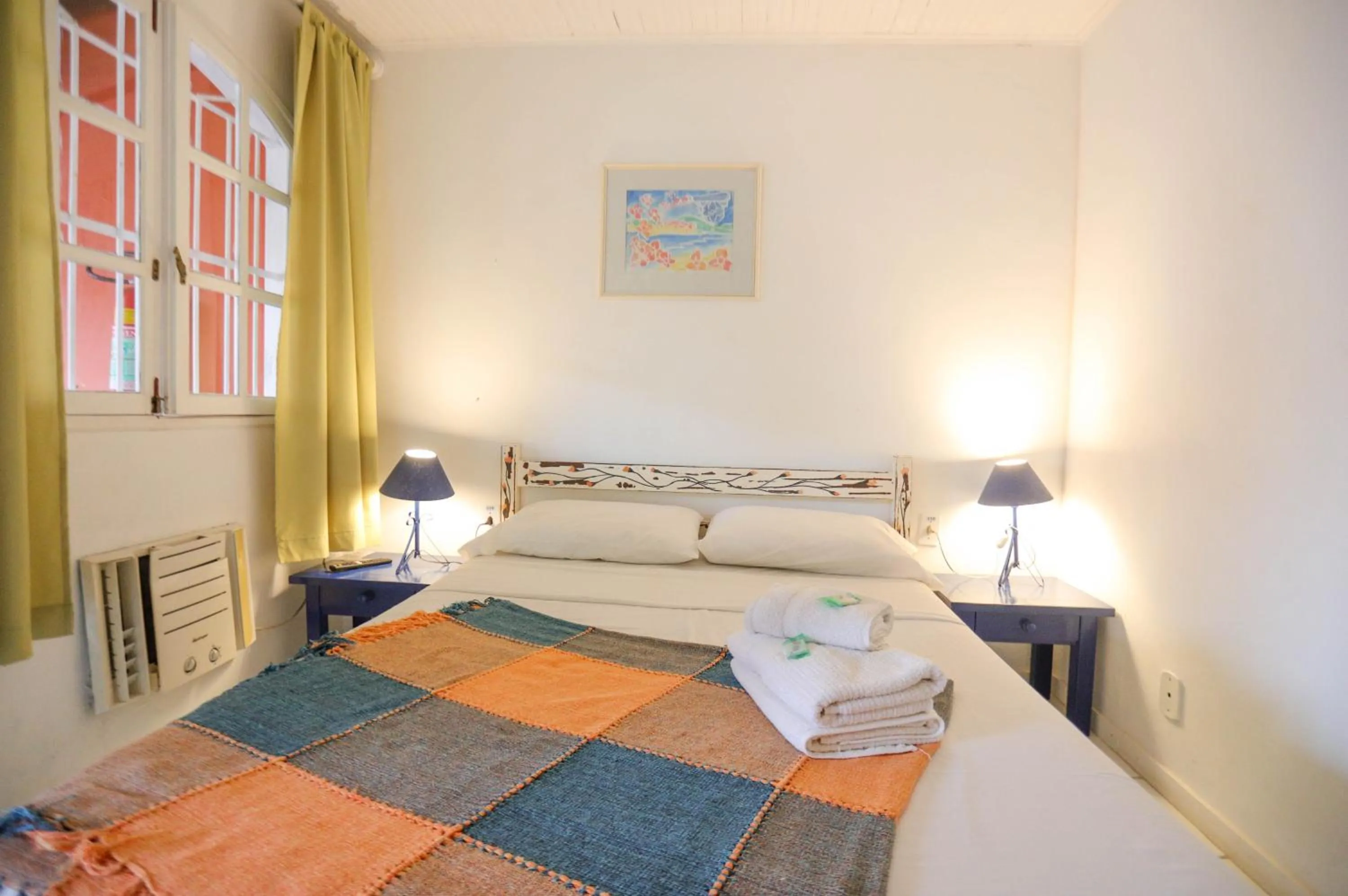 Photo of the whole room, Bed in POUSADA AMENDOEIRA