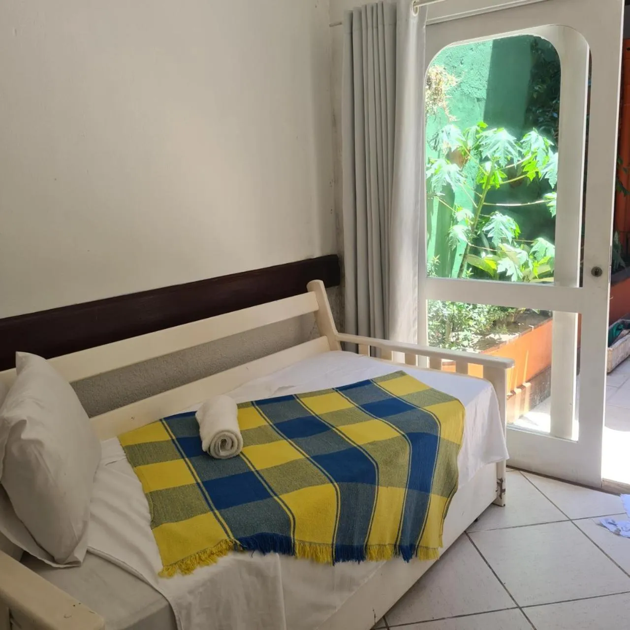 Bed in POUSADA AMENDOEIRA