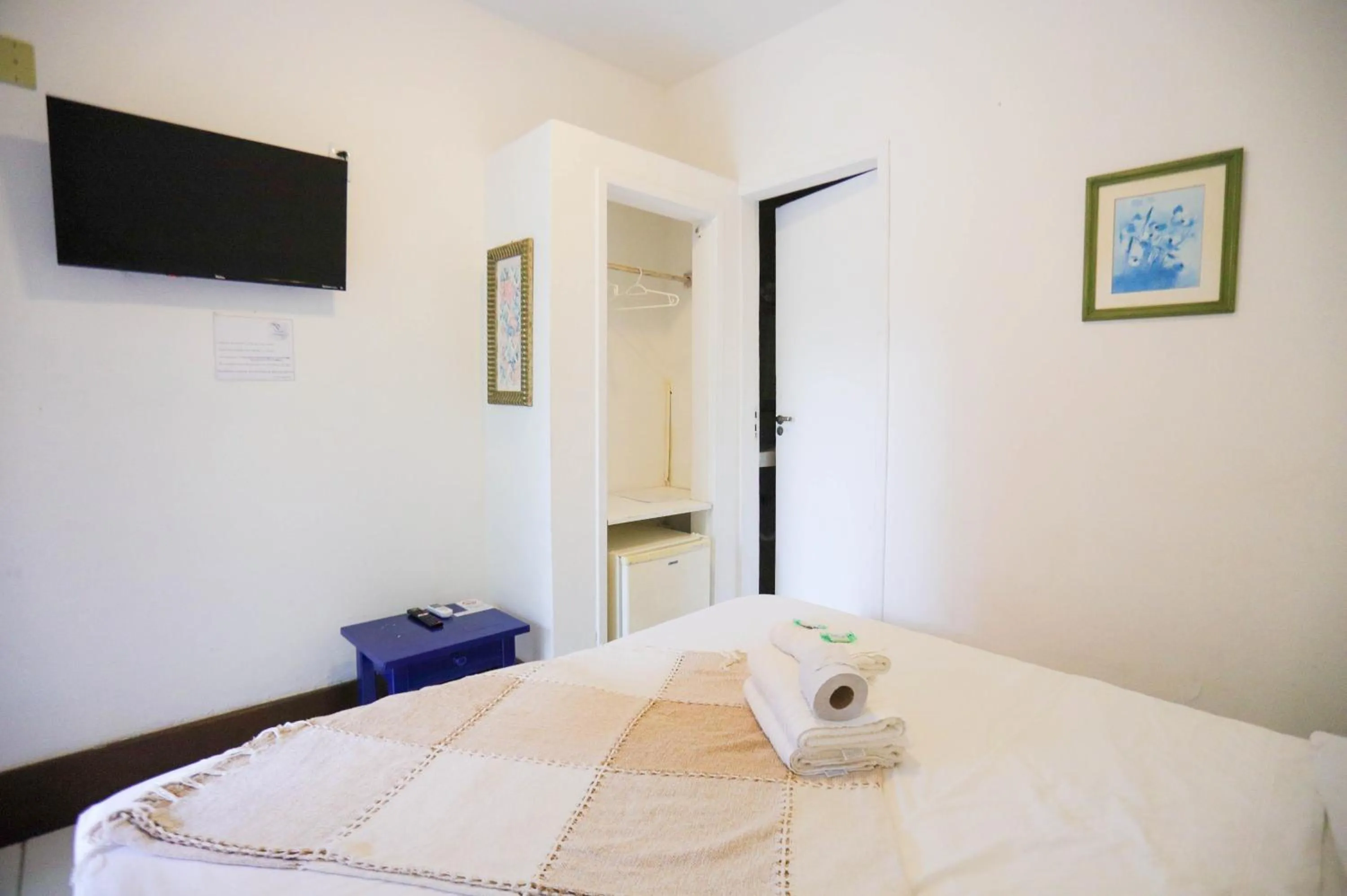 Bed in POUSADA AMENDOEIRA