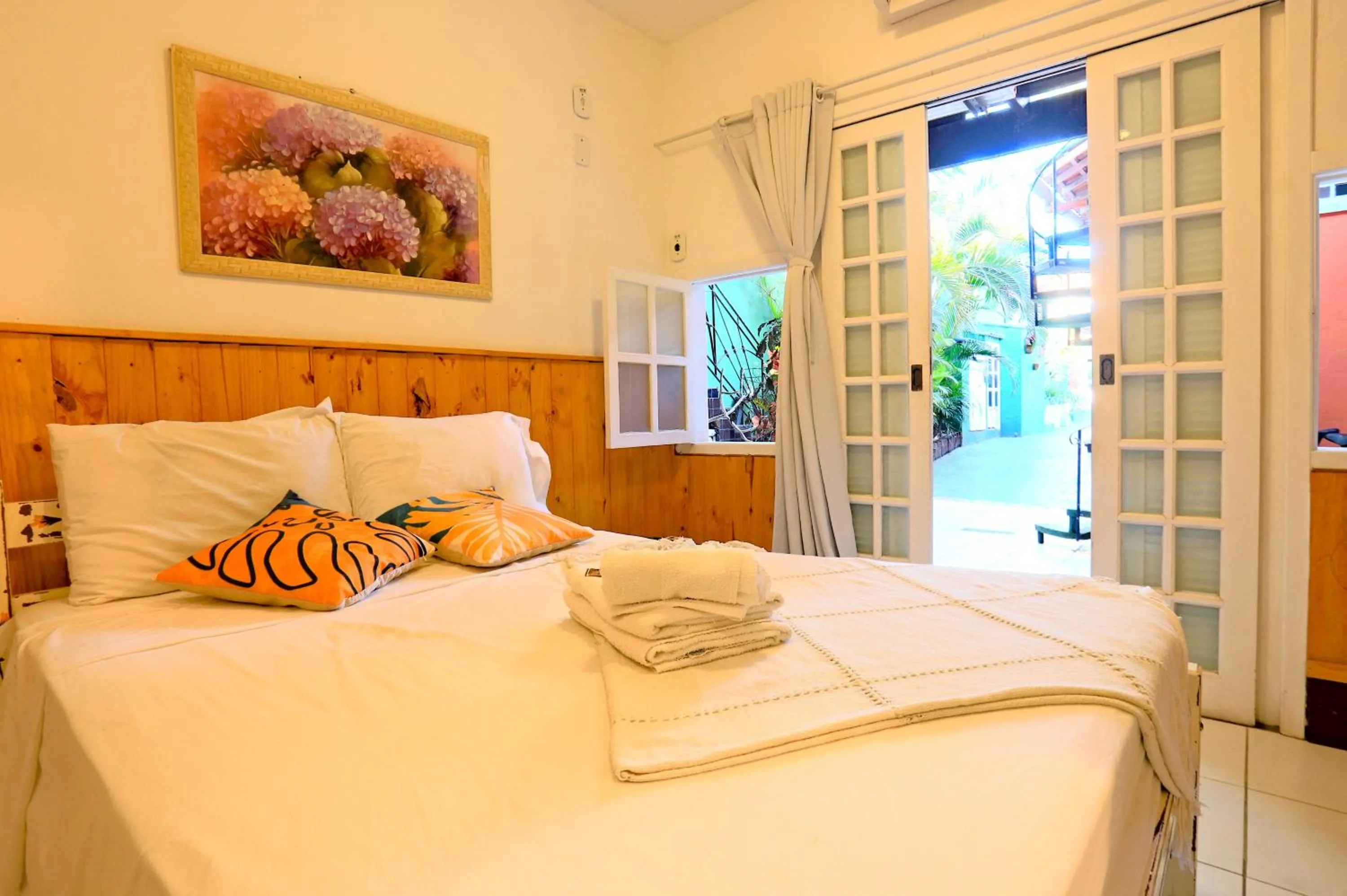 Photo of the whole room, Bed in POUSADA AMENDOEIRA