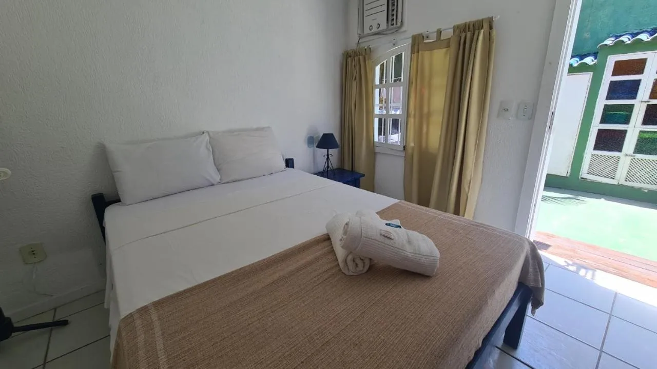 View (from property/room), Bed in POUSADA AMENDOEIRA