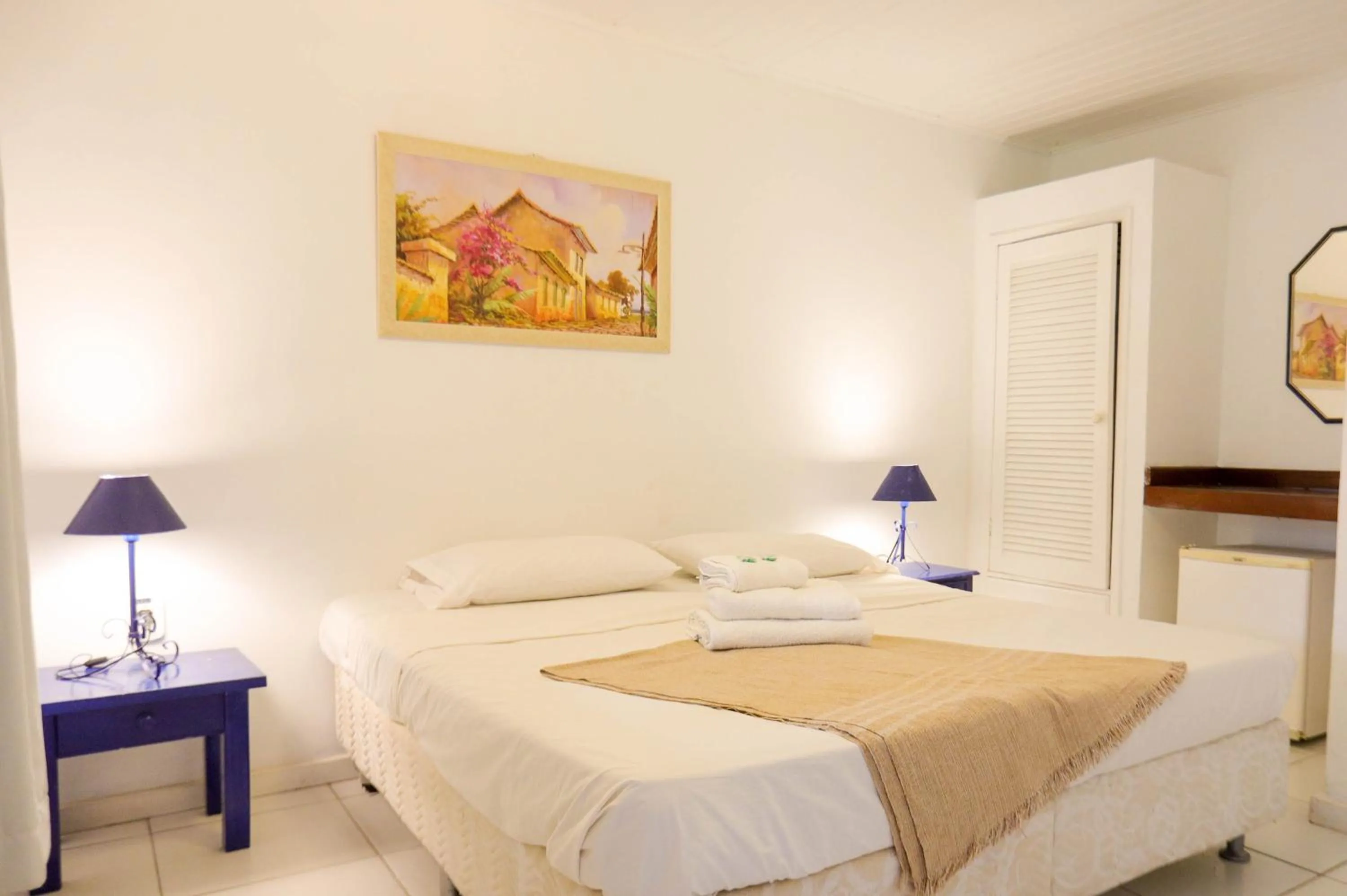 Bed in POUSADA AMENDOEIRA