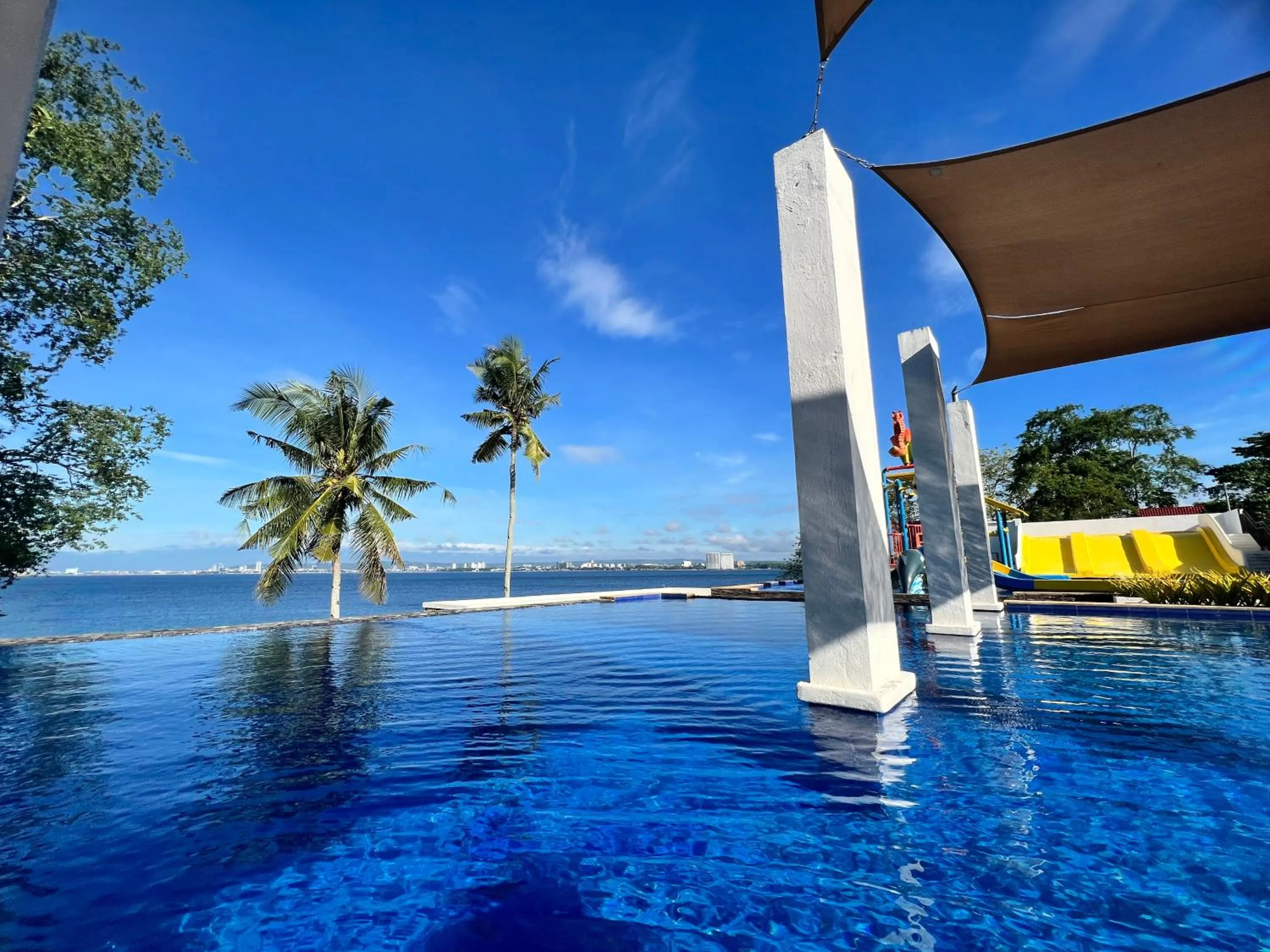 Pool view in Crusoe Cabins Costa Azalea