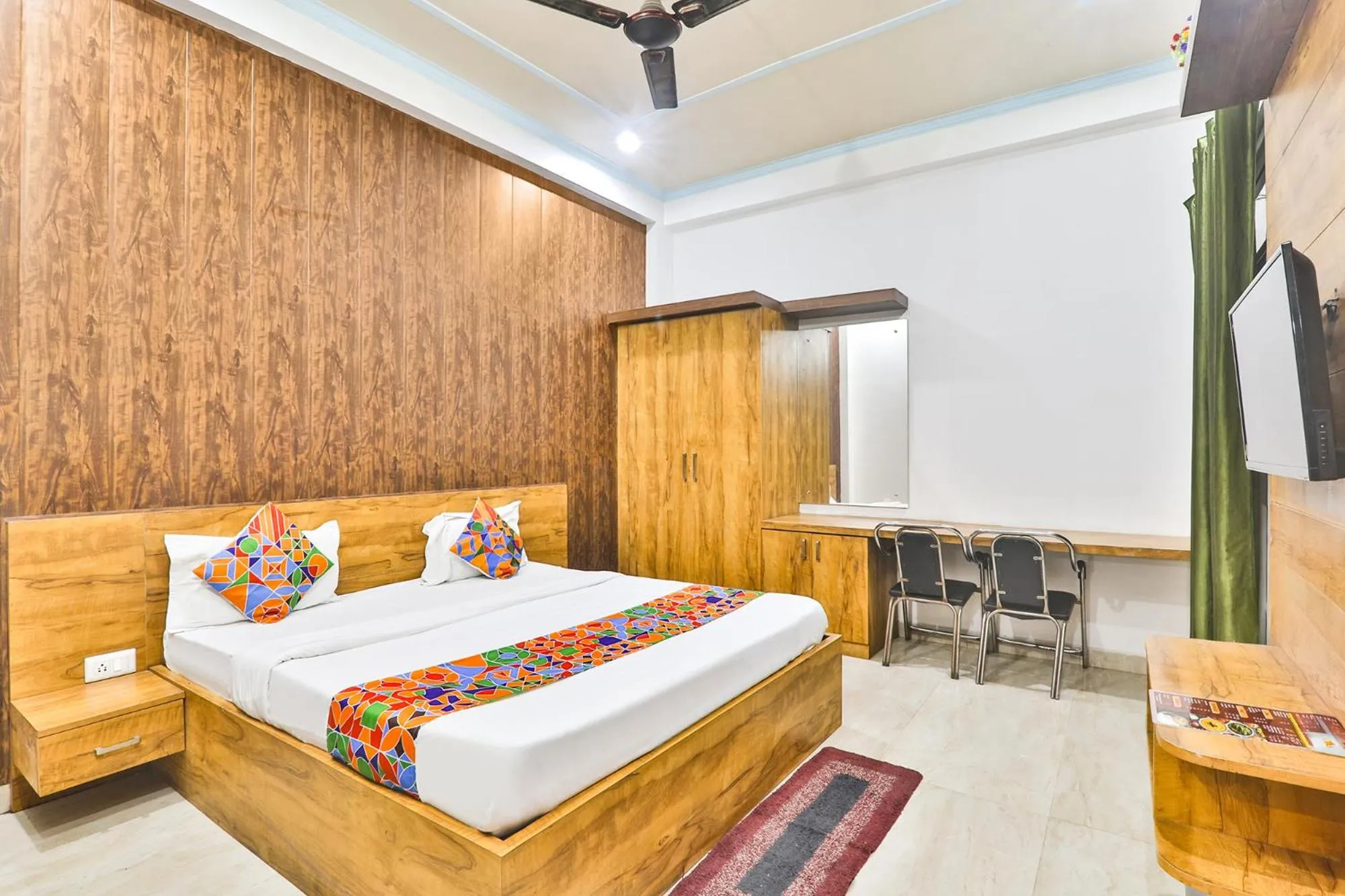 Bed in FabHotel Anant Inn