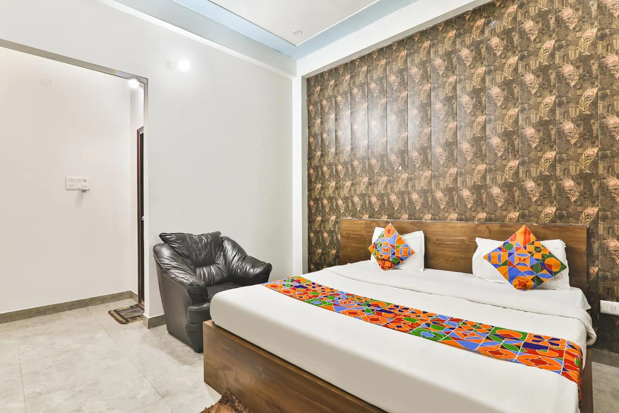 Bed in FabHotel Anant Inn