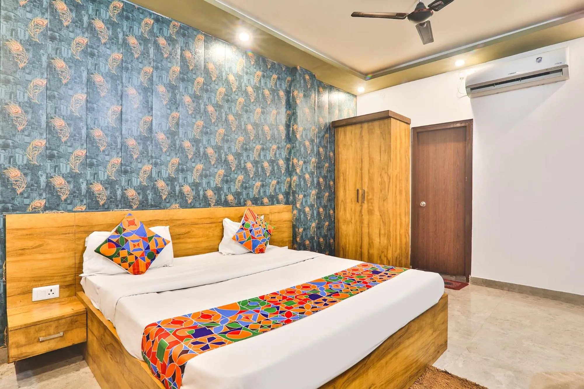 Bed in FabHotel Anant Inn