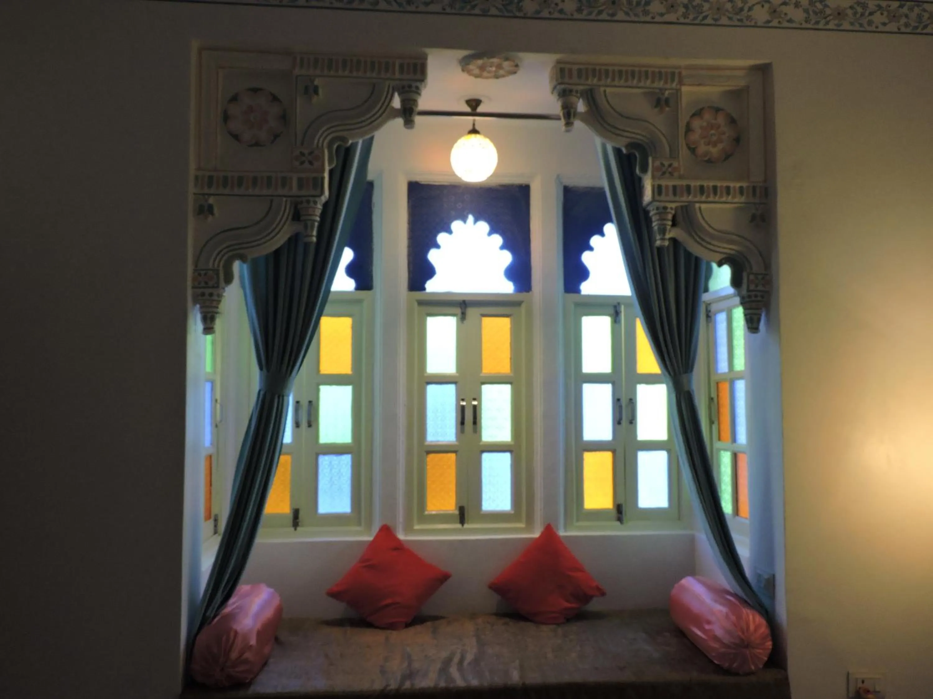 Seating area, Bed in Hotel Ushaan Haveli