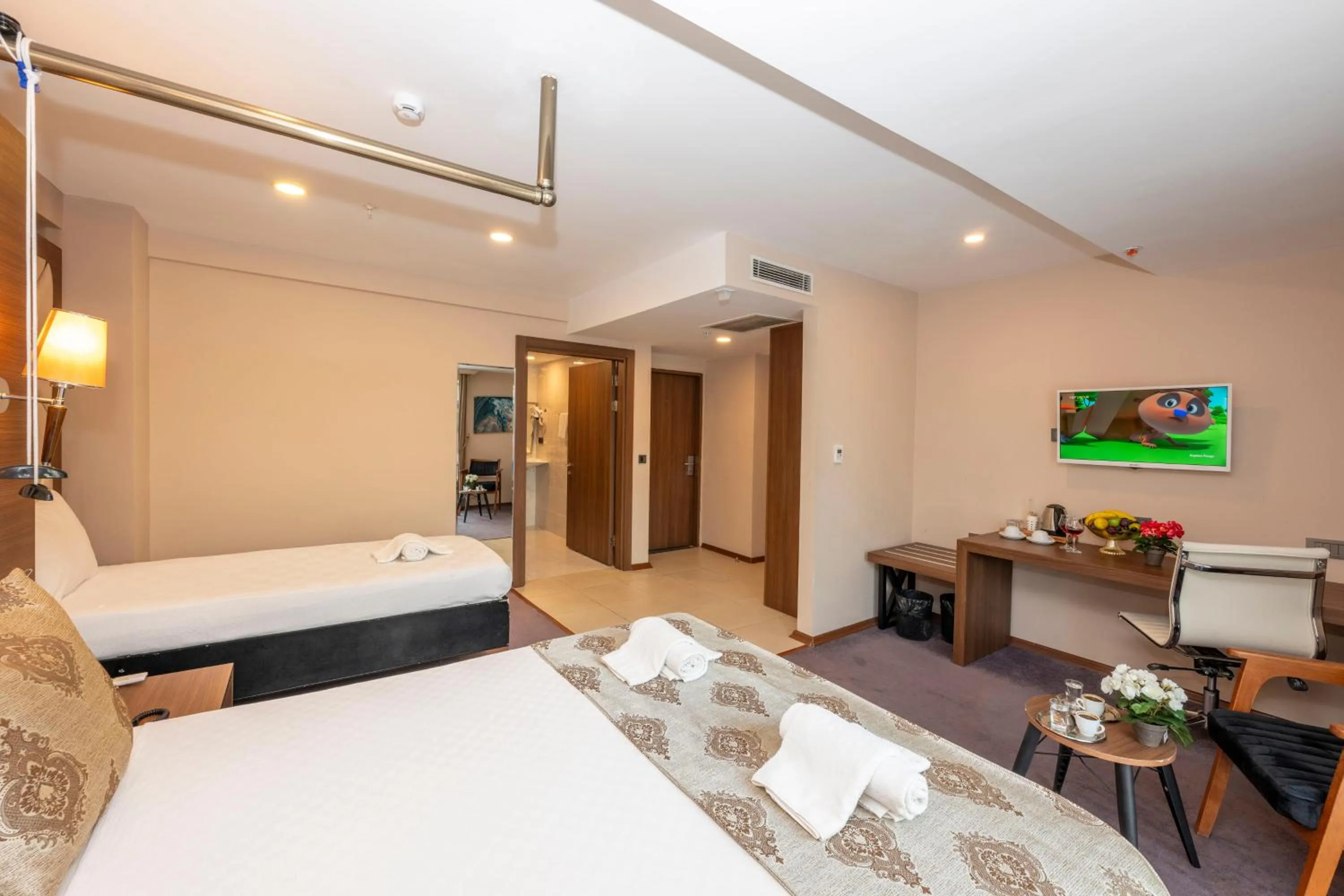 Bed in Litros Hotel & Spa