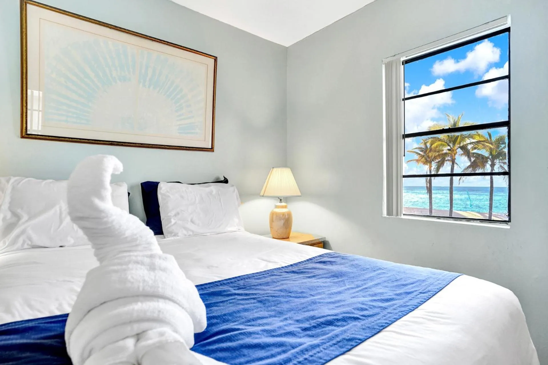 Bed in Neptune Oceanfront Rentals