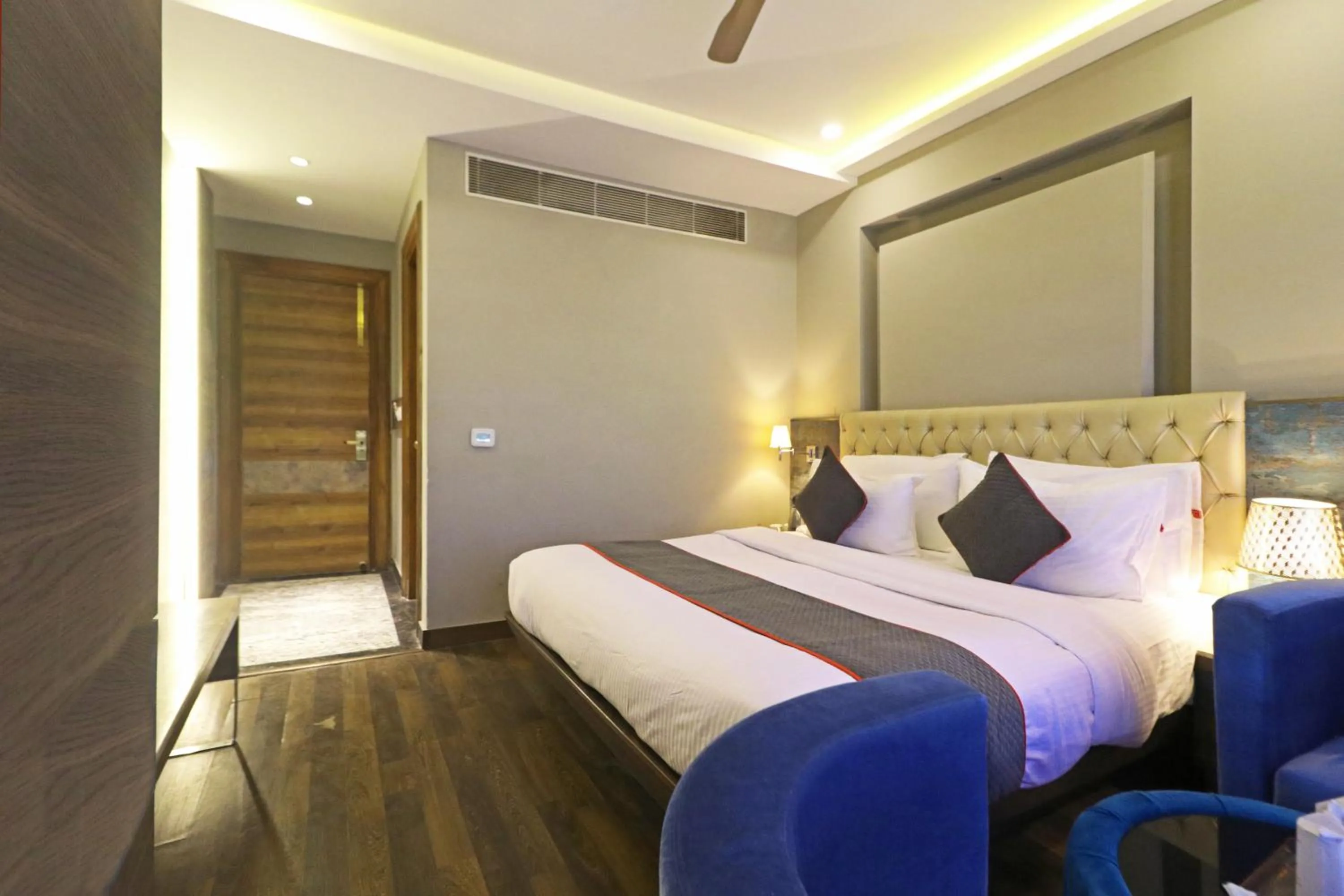 Photo of the whole room, Bed in The IVY Grand Hotel - 5 Minutes from Connaught Place and New Delhi Railway Station With Free Secured Parking