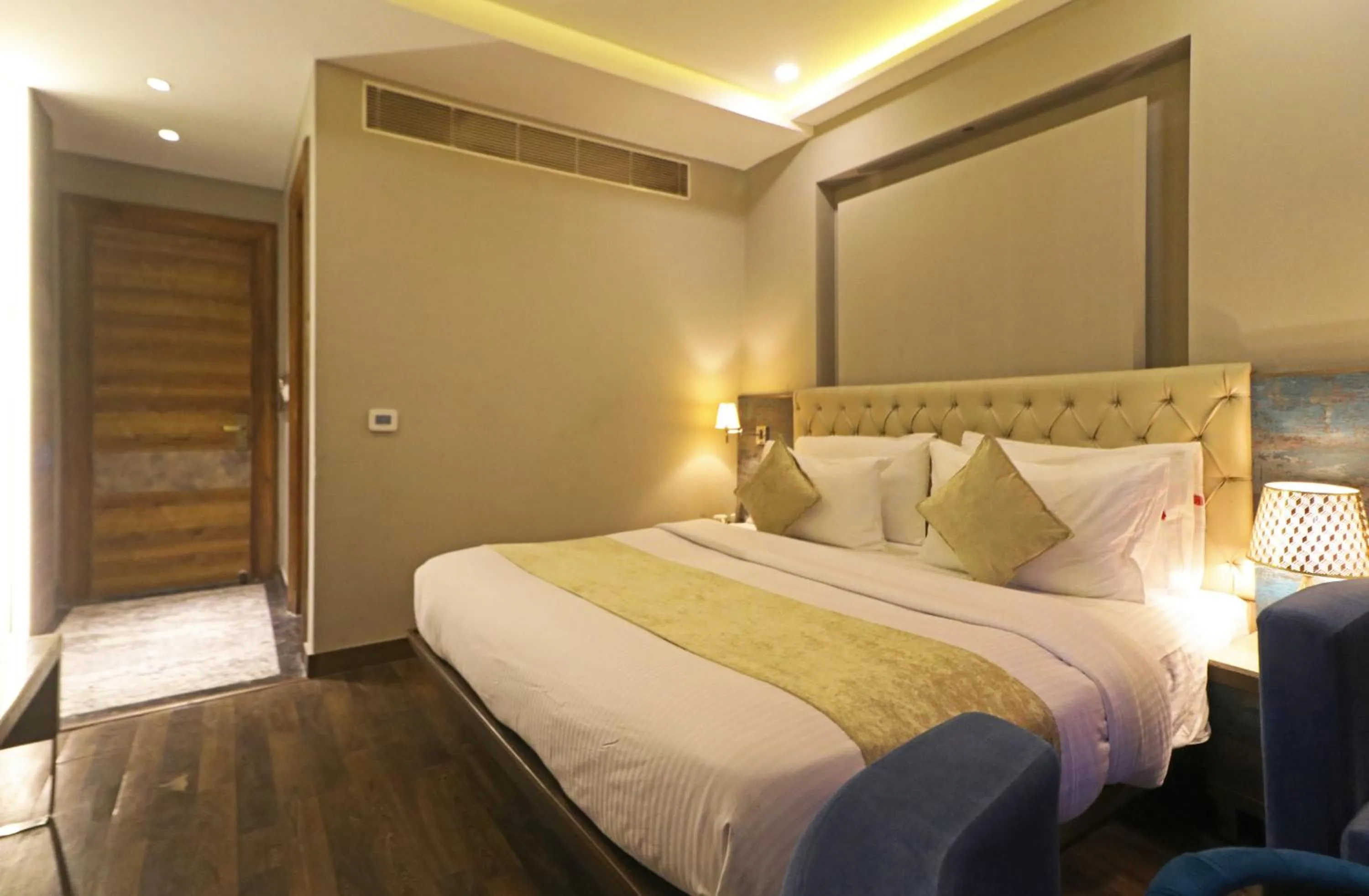 Photo of the whole room, Bed in The IVY Grand Hotel - 5 Minutes from Connaught Place and New Delhi Railway Station With Free Secured Parking