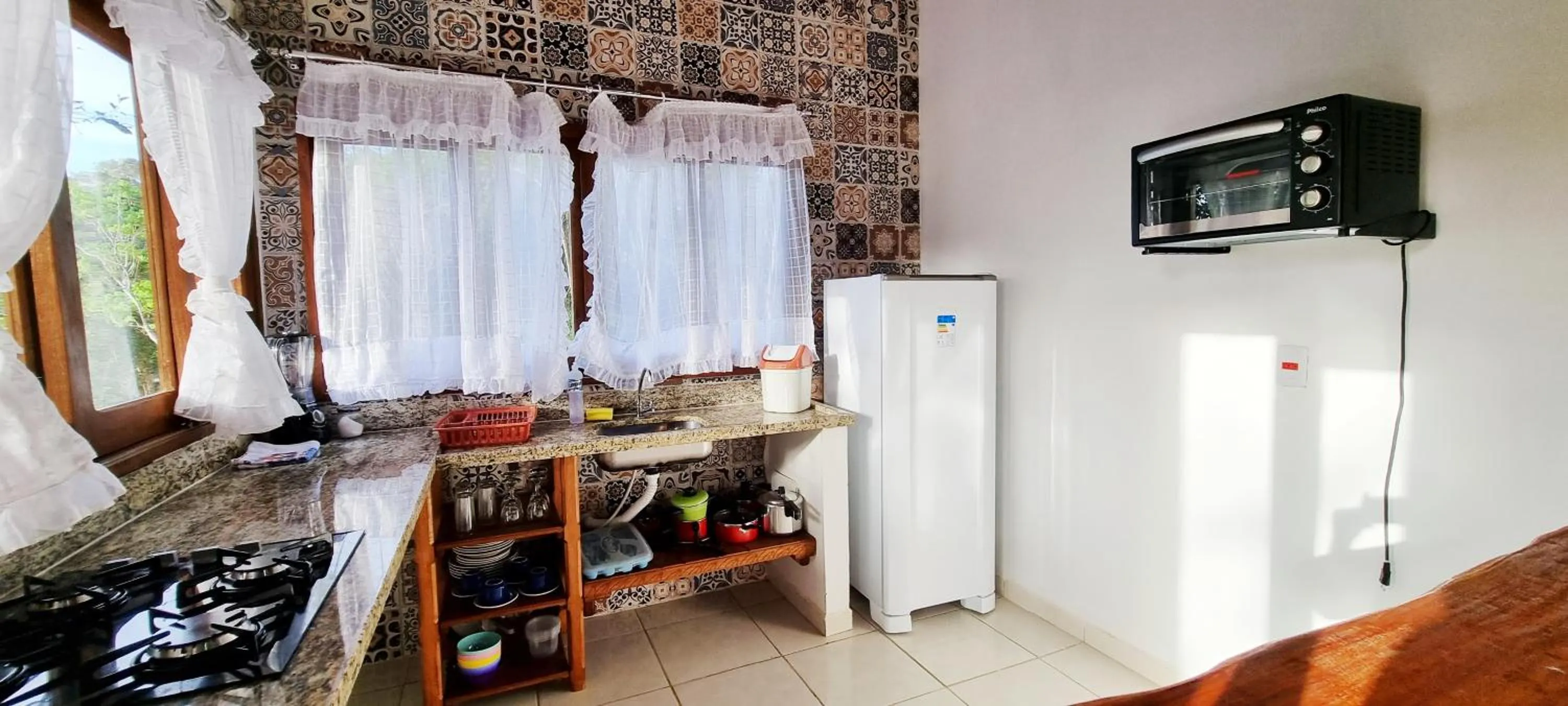 Kitchen or kitchenette in Chalés Pura Vida