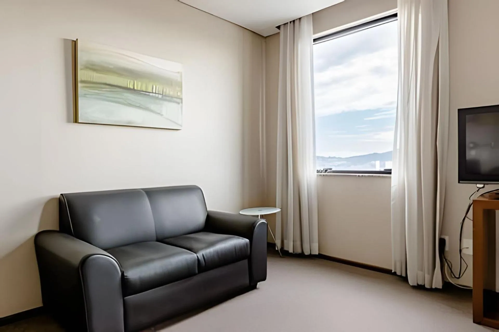 Living room in Hospedez - Flat Osasco Trade Center