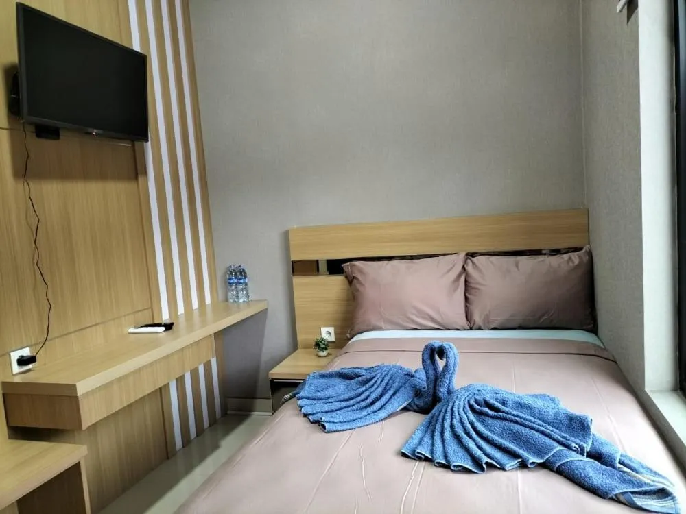 Bed in Cozy Residence Tomang