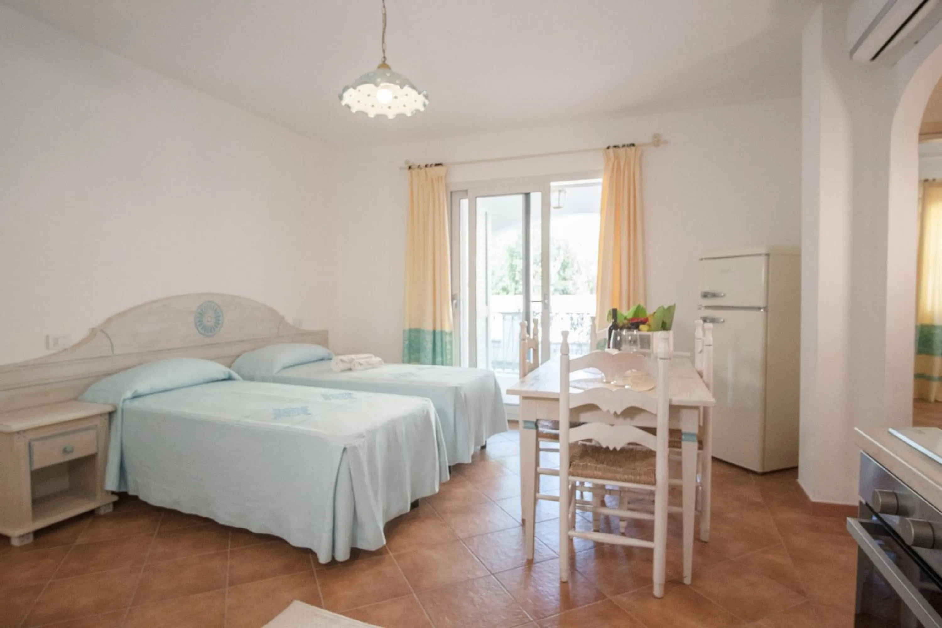 Living room, Bed in Le Residenze del Golfo di Orosei