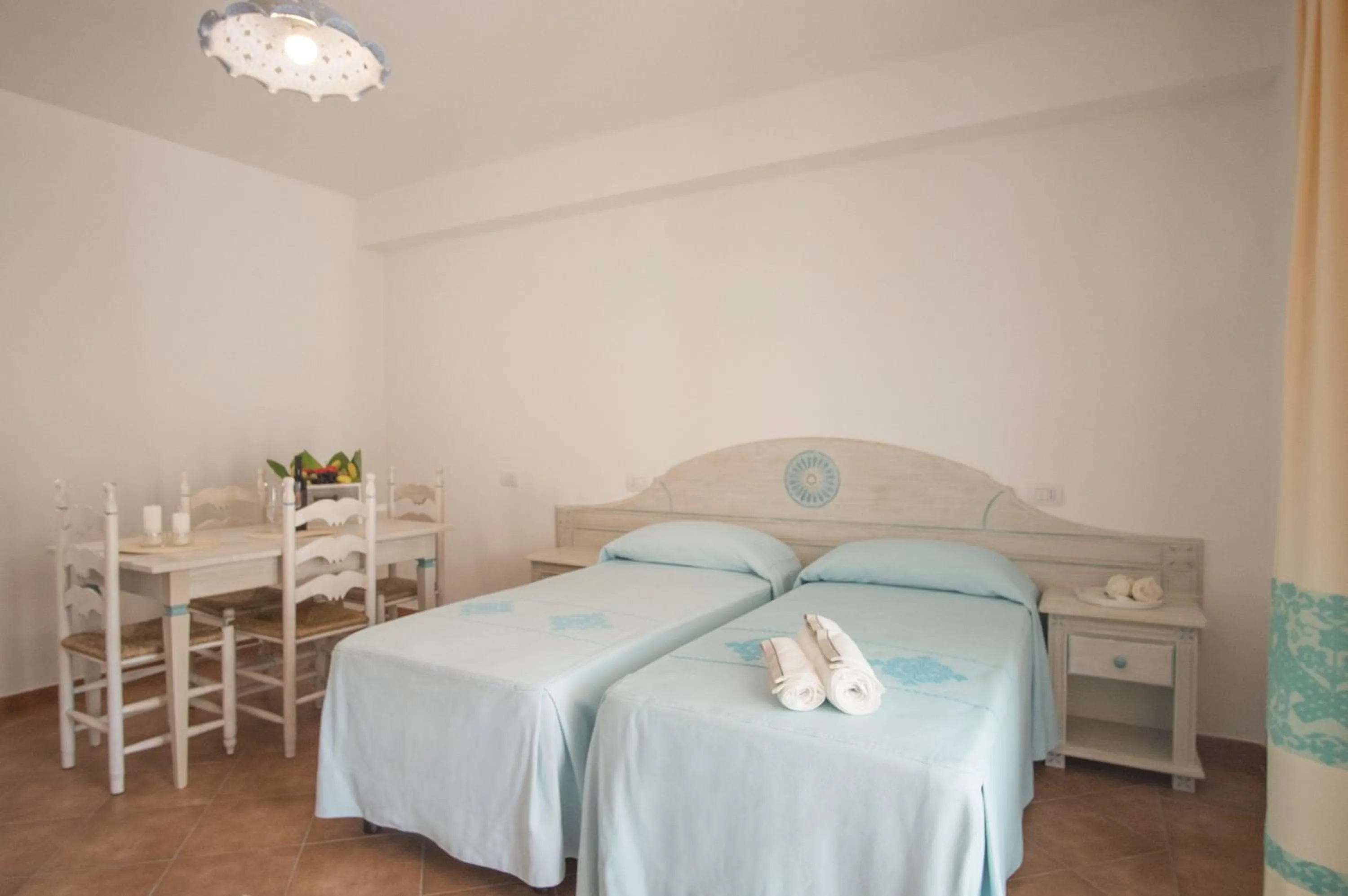 Bed in Le Residenze del Golfo di Orosei