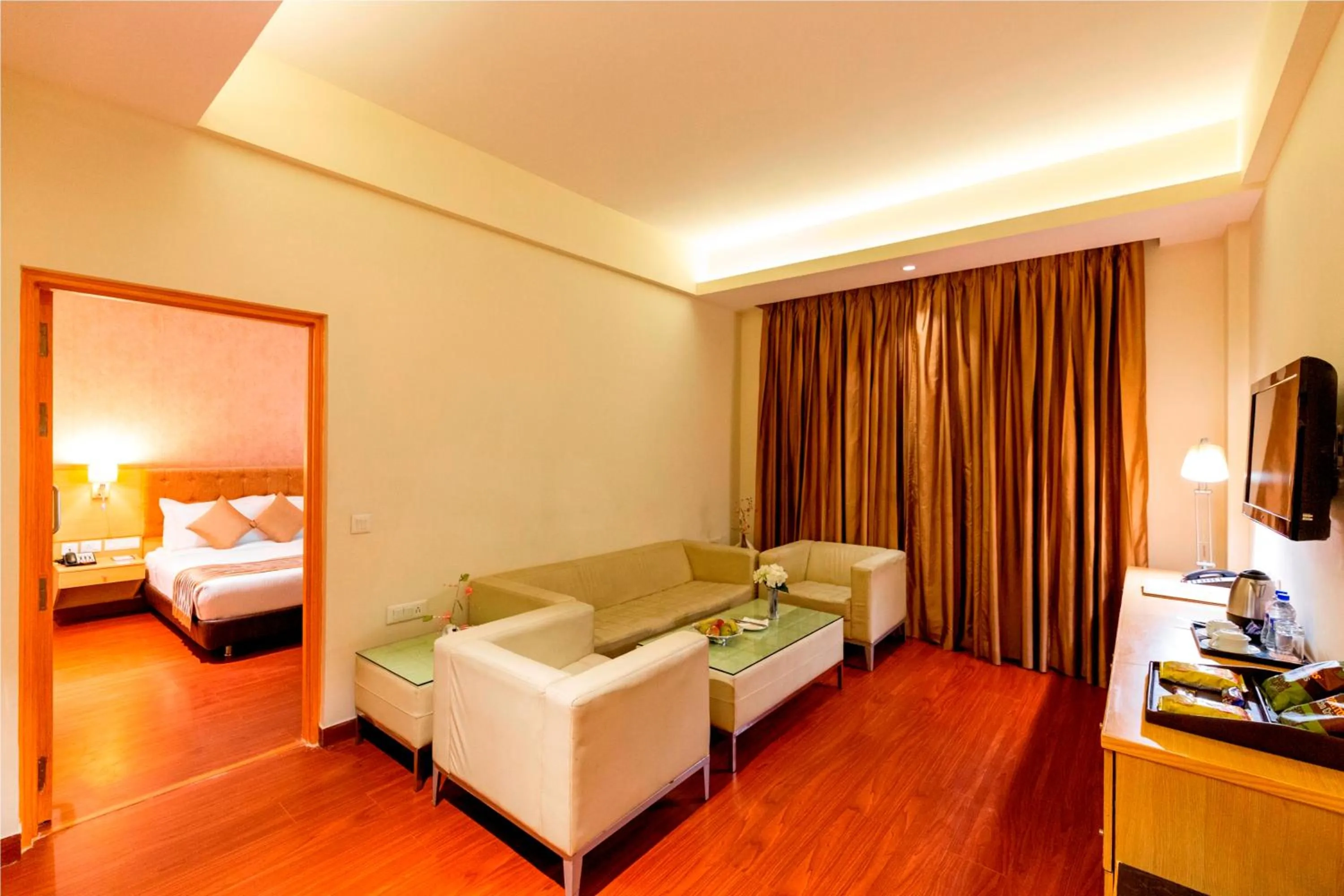Living room, Bed in Ramada Neemrana