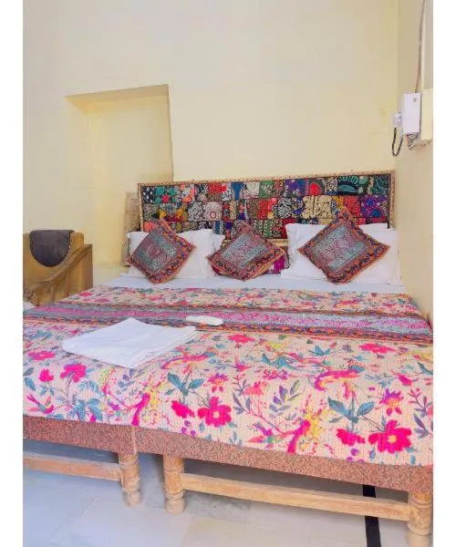 Bed in Hotel Neem Haveli