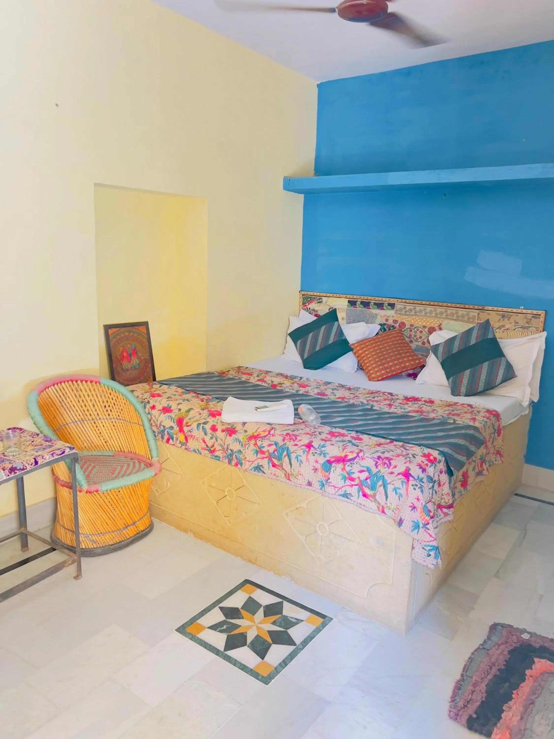 Bed in Hotel Neem Haveli