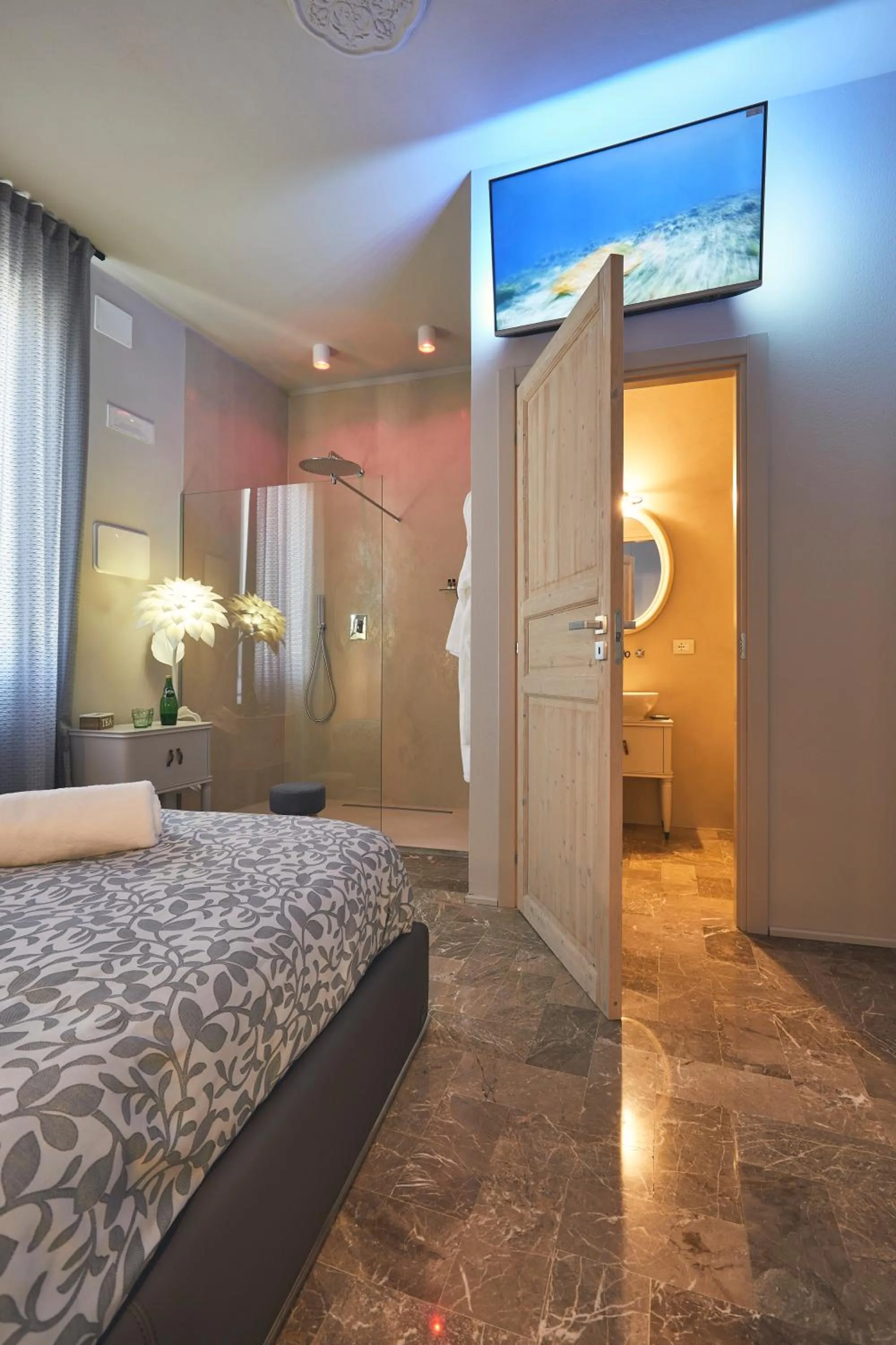 Bed in Le Stagioni Luxury Suite