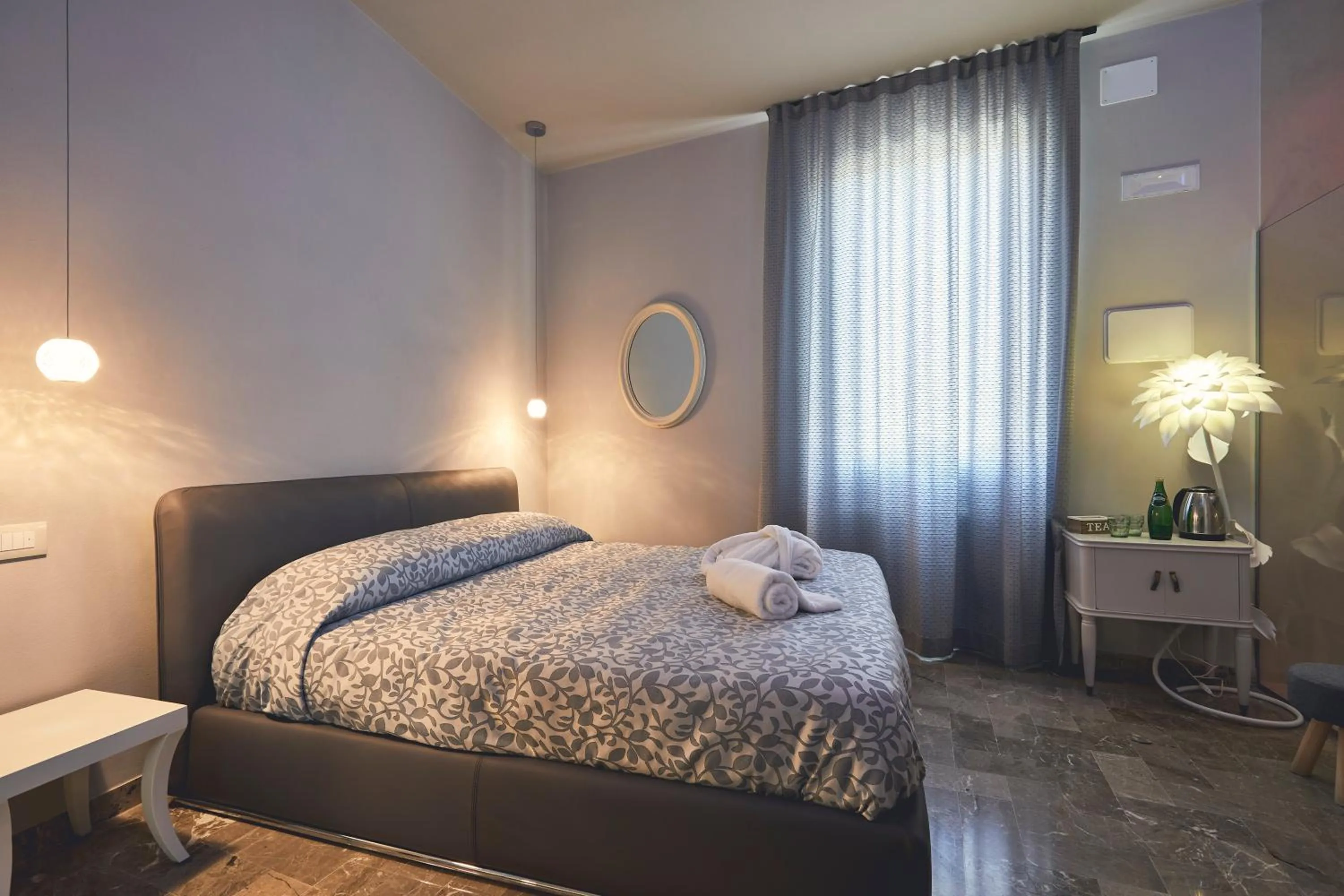 Bed in Le Stagioni Luxury Suite