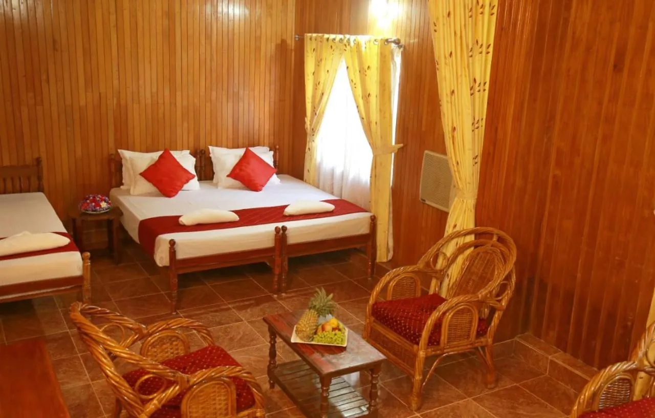 Bed in Lake Palace Family Resort Kumarakom