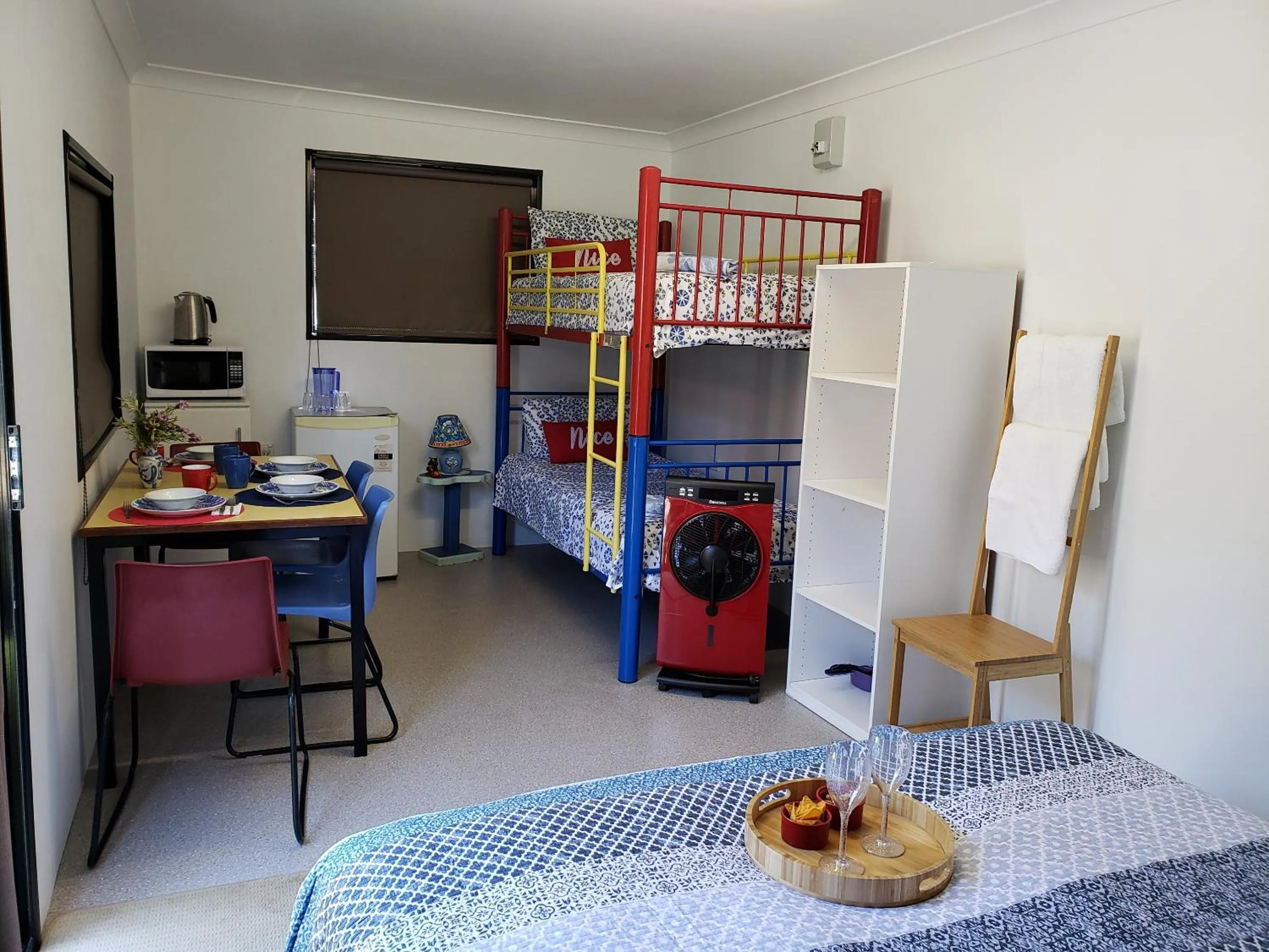 Bed in Christmas Creek Café & Cabins