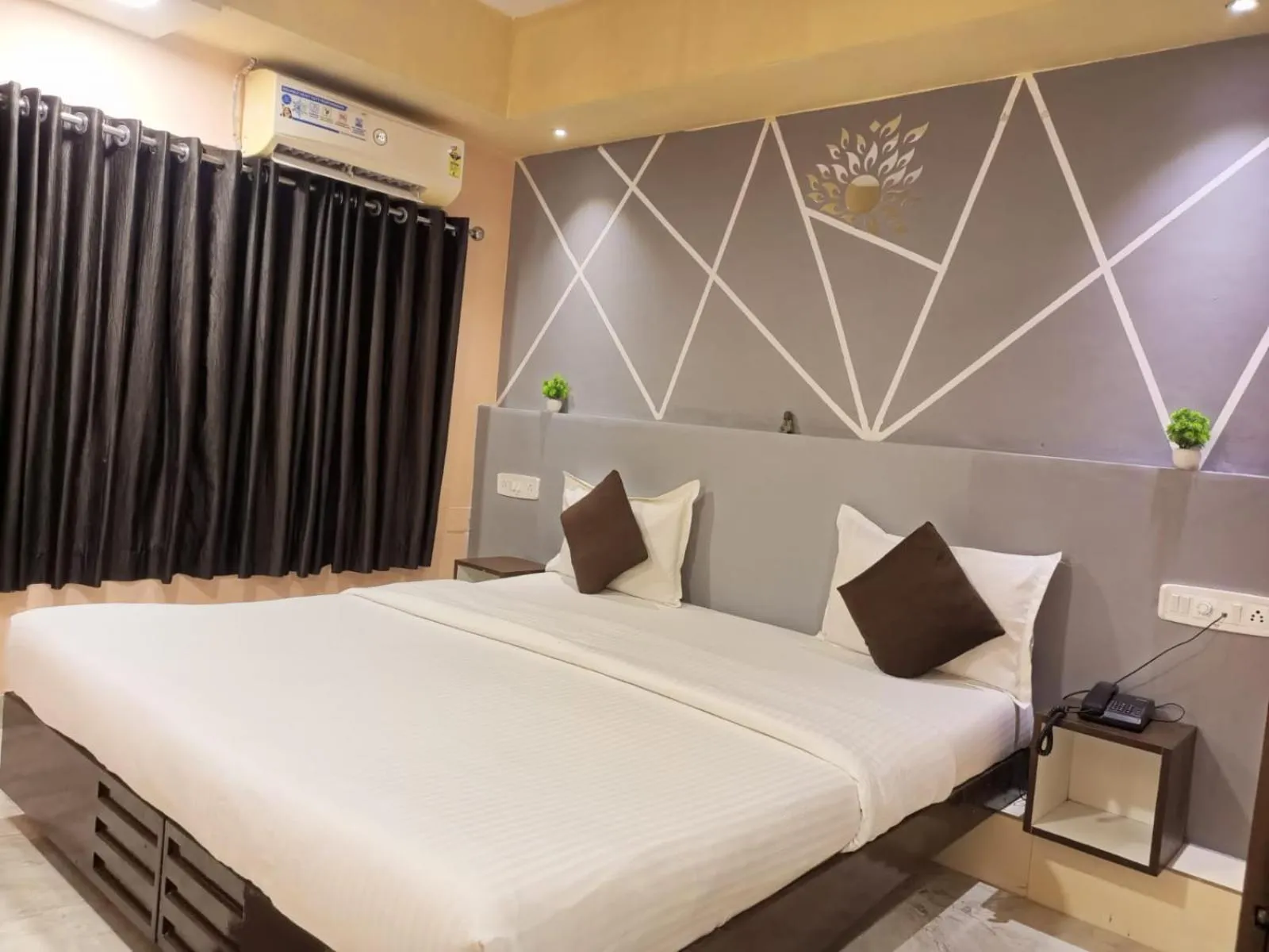 Bed in HOTEL HARMONY