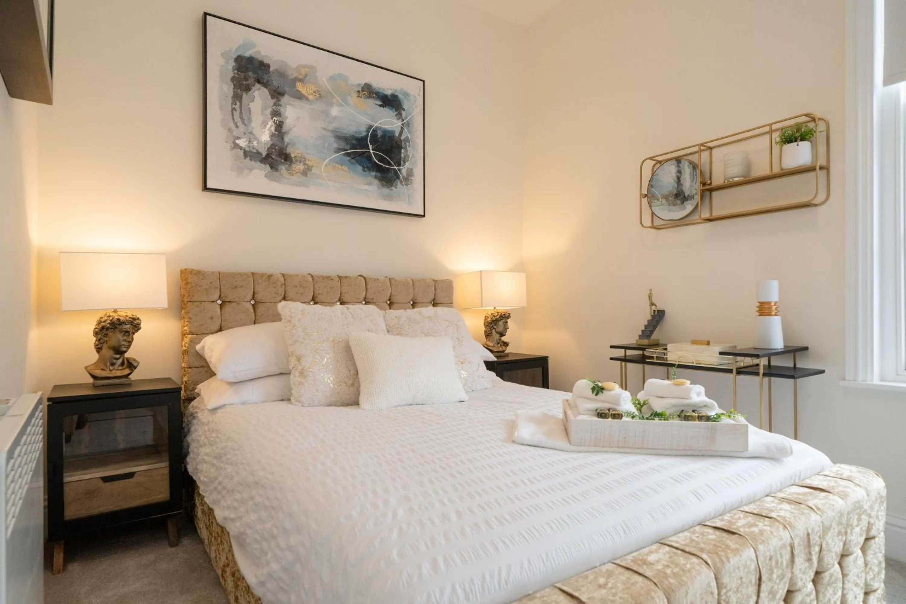 Bed in The Regal Apartment