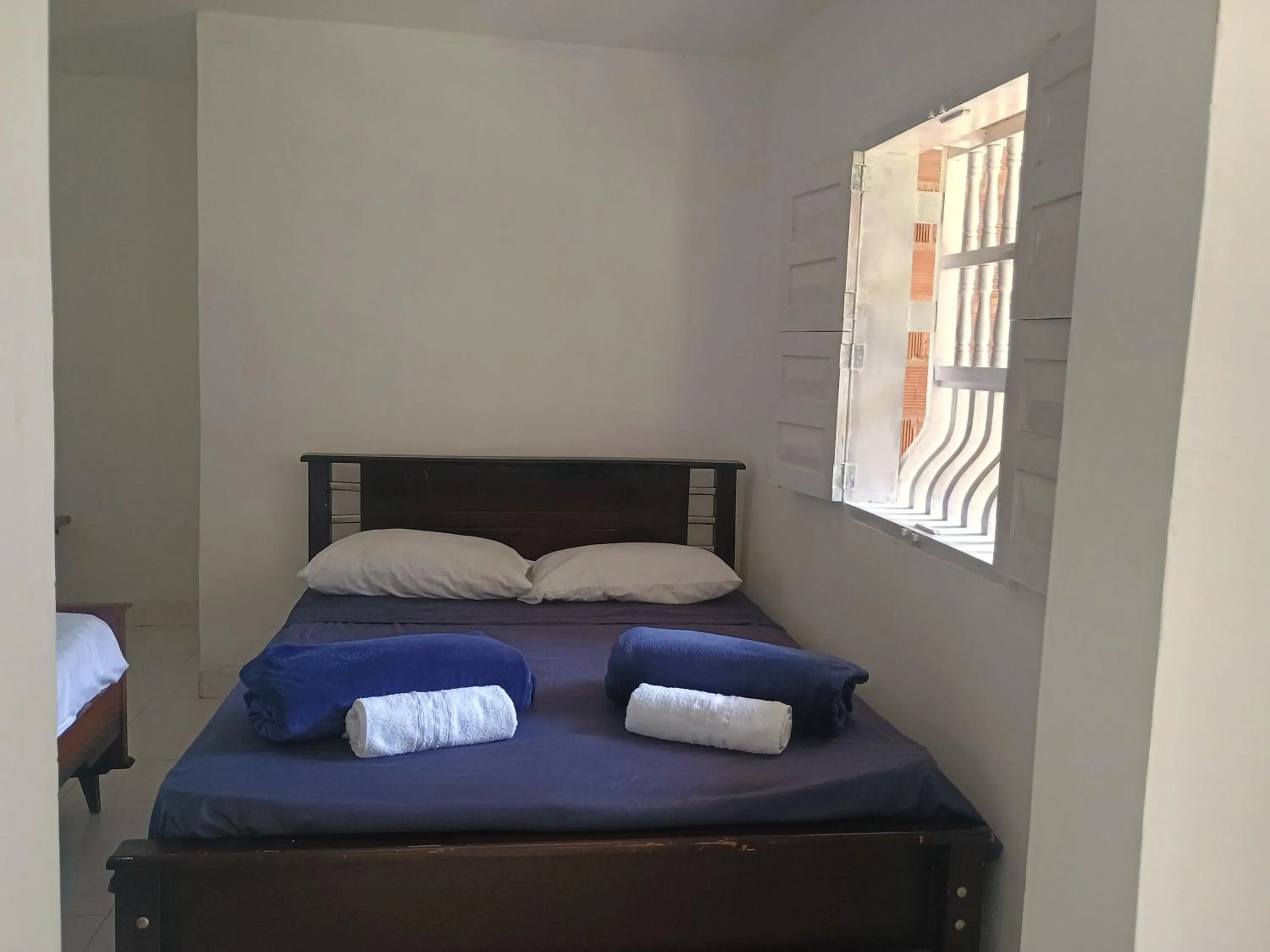 Bed in BioHotel Ecohouse