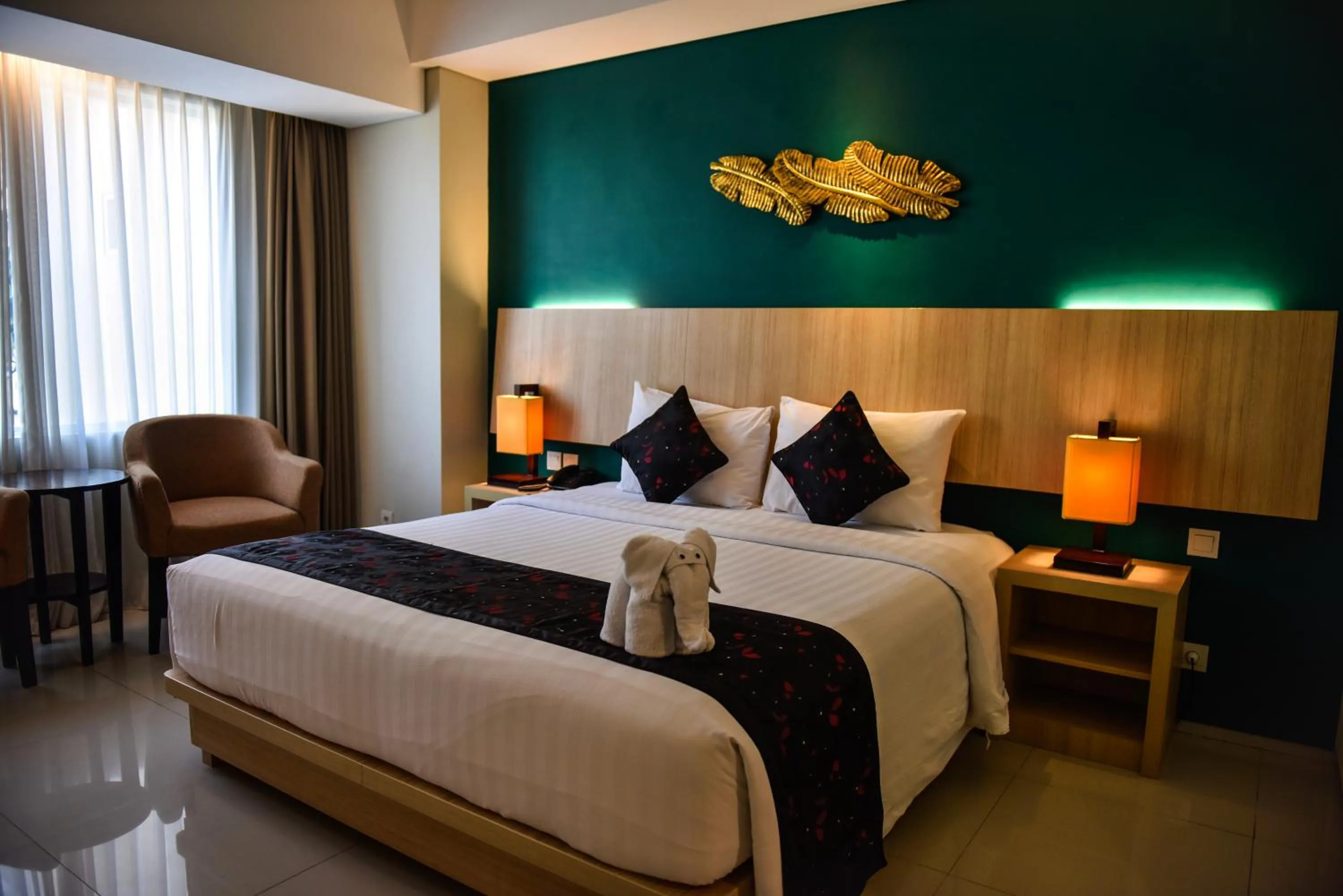 Bed in The Kana Kuta Hotel