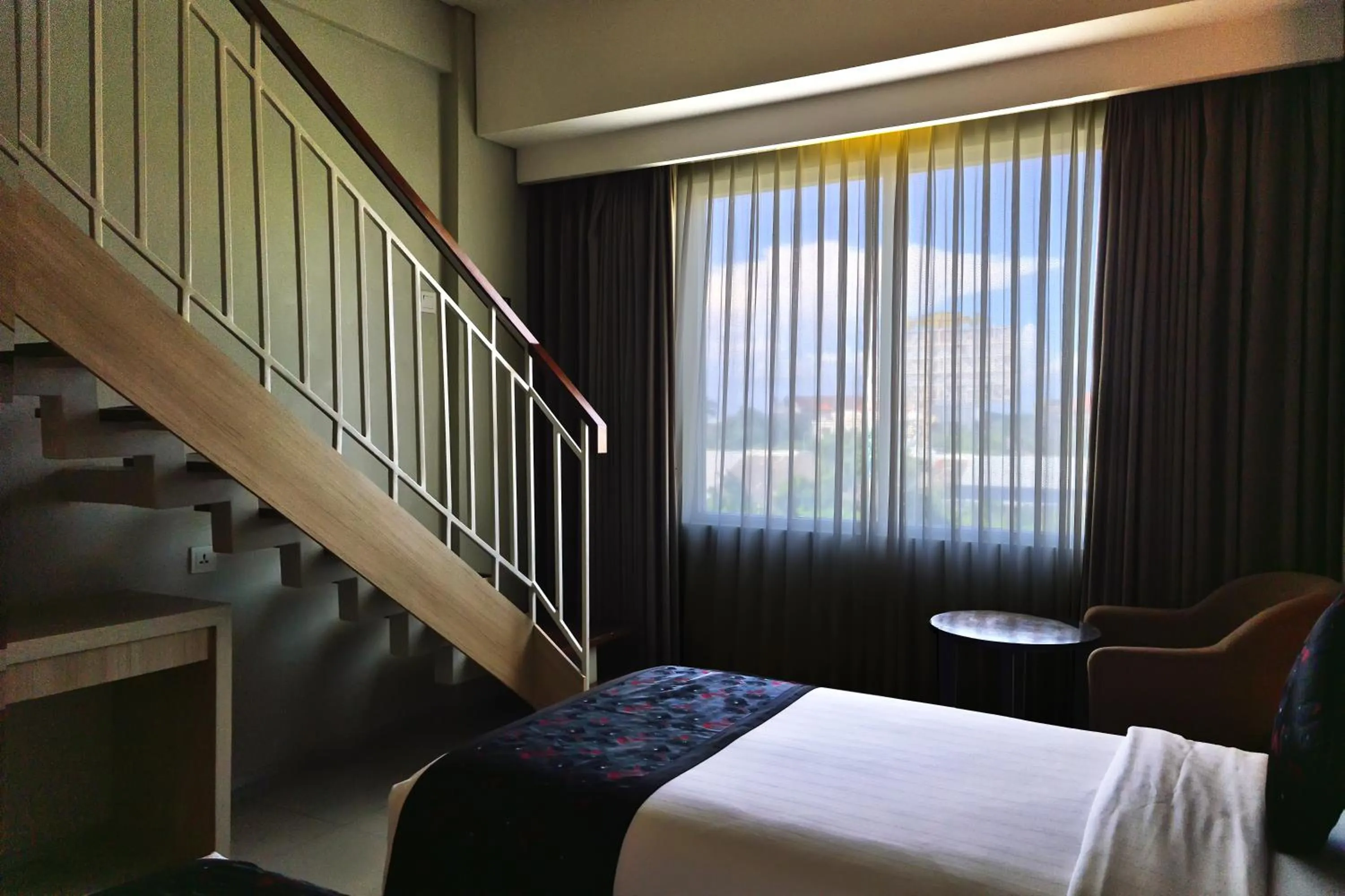 View (from property/room), Bed in The Kana Kuta Hotel