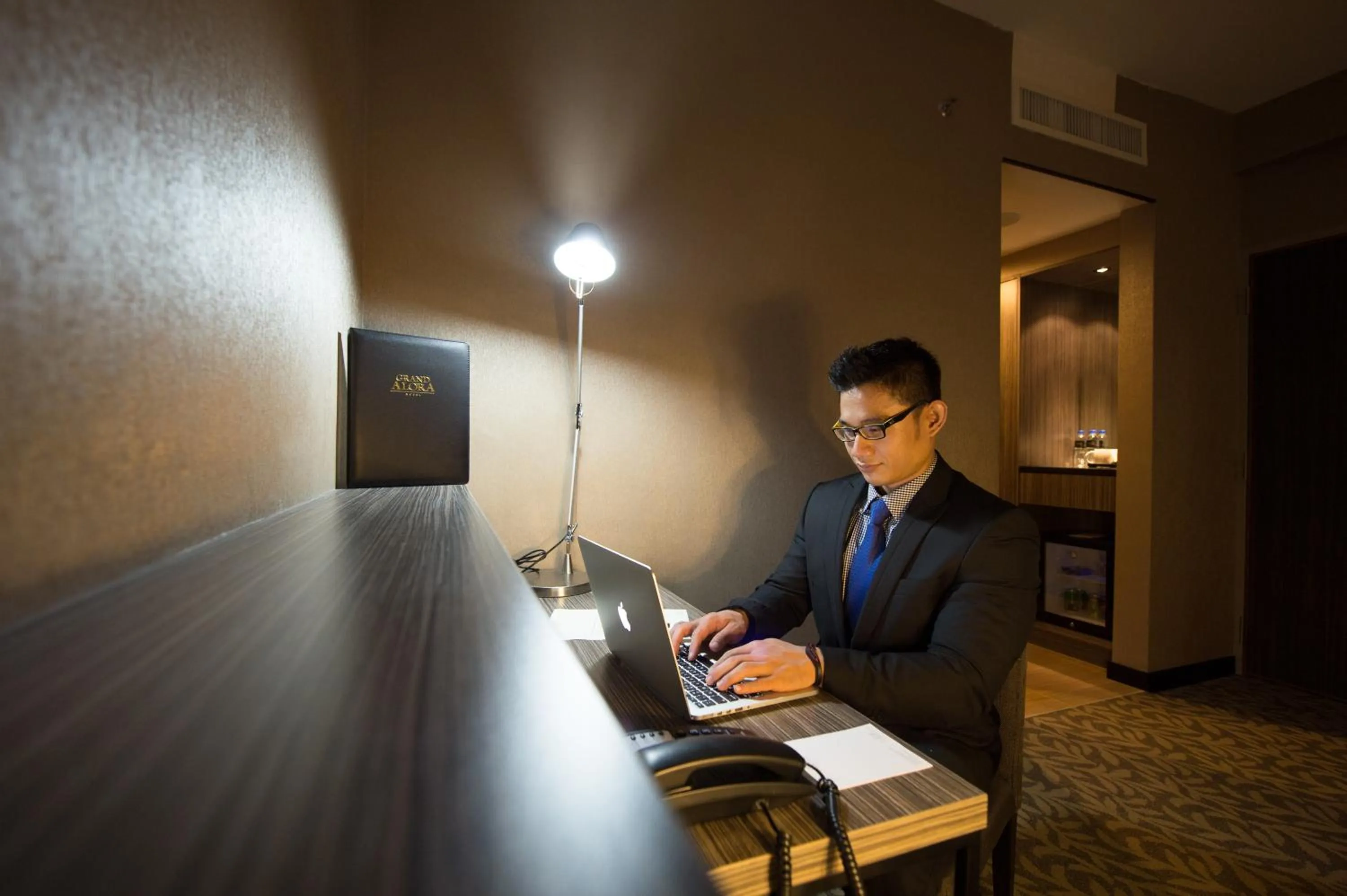 Seating area in Grand Alora Hotel