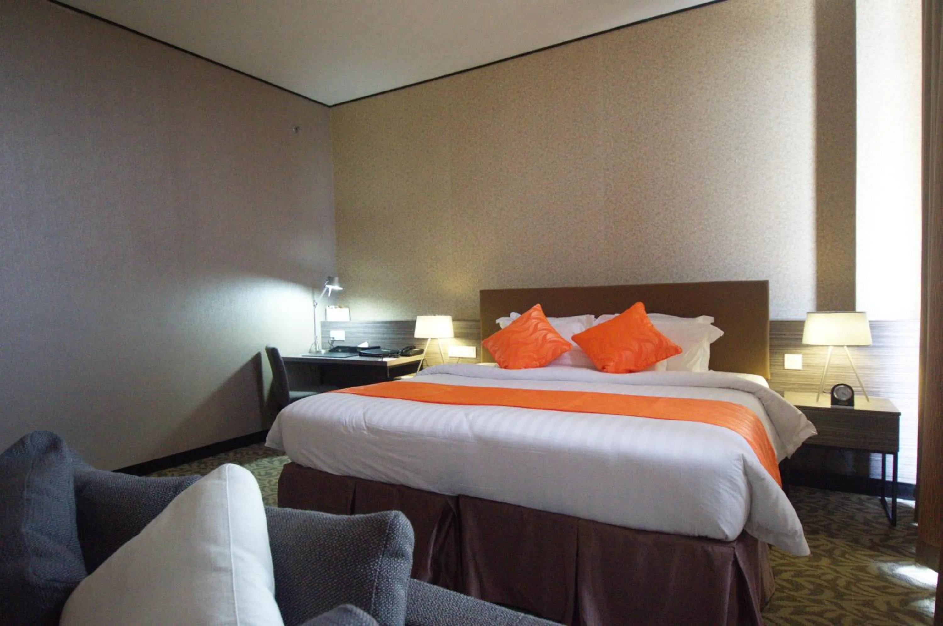 Photo of the whole room, Bed in Grand Alora Hotel