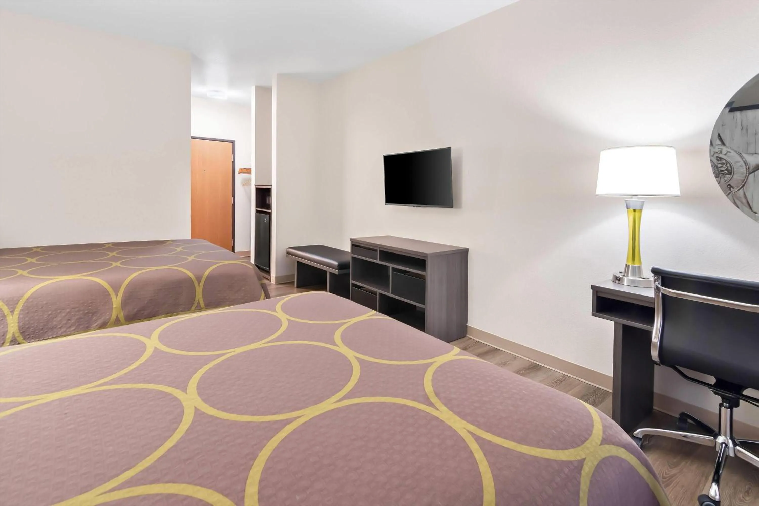 Bed in Super 8 by Wyndham Fort Worth Stockyards